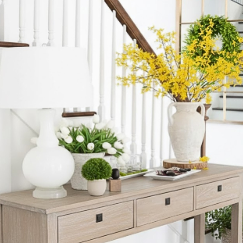 One branch changes everything. 🌿

This spring console proves you don't need a dozen accessories to make an impact—just smart layering with a hero moment (hello, forsythia!) and a few key pieces that work year-round.

The white lamp, boxwood topiary, woven tray, and books stay put. Swap the forsythia for seasonal stems and you've got a formula that transitions through the entire year. Efficient styling that actually converts to a livable home.

Shop every piece in my storefront → link in bio

.

#springdecor #consoletable #entrywaydecor #consoletablestyling #springhome #homedecor #entryway #consoletabledecor #forsythia #springdecorating #neutraldecor #modernfarmhouse #organicmodern #entrywayideas #foyer #foyerdecor #coastaldecor #studiomcgee #ltkhome #shopltk #amazonhome #targetstyle #naturalhomedecor #springrefresh #entrywaytable #howihome #springvibes #homedecorideas #interiordesign #styleitlight #neutralhome #modernhome #organichome #consoledecorating #entrywaystyling #naturalwood #springinspo #shopthelook #liketkit #budgethomedecor #affordablehomedecor #homesweethome #interiorinspiration #decoratingideas #homedecorating #housetour #housebeautiful #mybhg #sodomino #homegoals #interiorstyling 

 #LTKHome