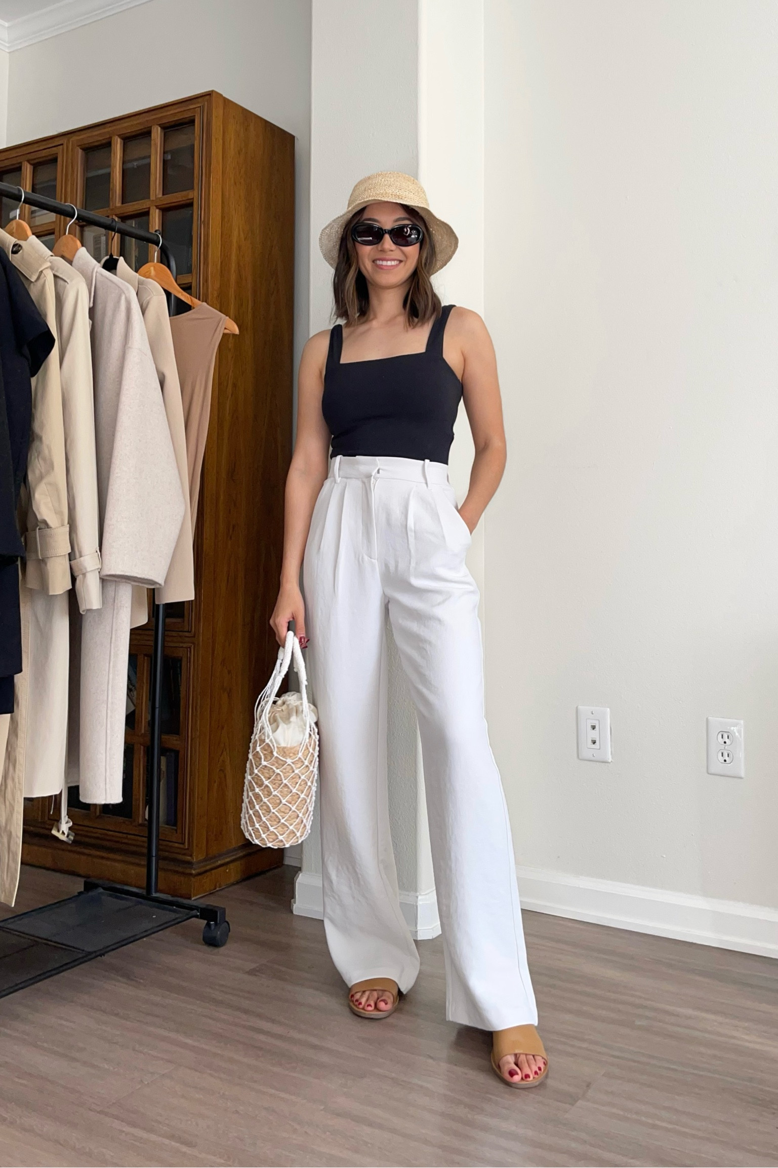 Spring/summer vacation outfit - on sale! 

Top - small 
Pants - 25 tts but if between sizes go up/waist is tight 

White trousers / straw woven tote / sun hat / 

#LTKstyletip #LTKsalealert #LTKSeasonal