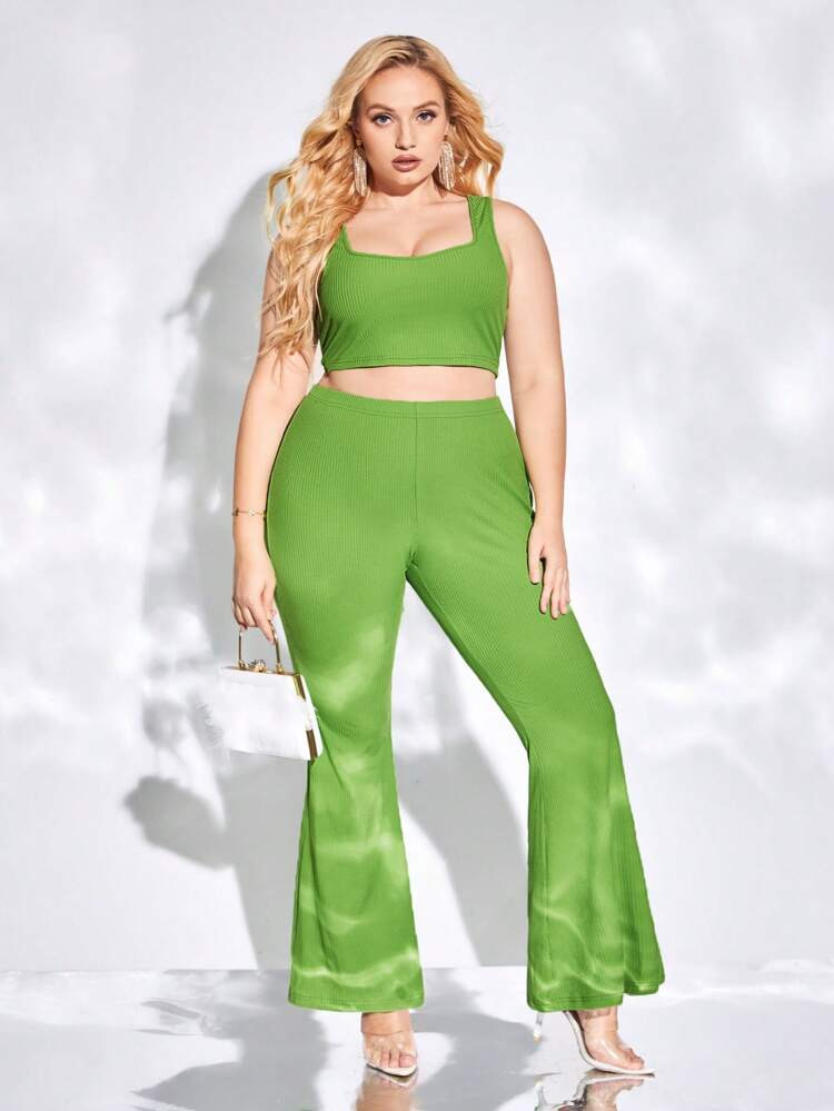 New
     
      evoluSHEIN X Anitta Plus Solid Crop Tank Top & Flare Leg Pants
       
          ... | SHEIN