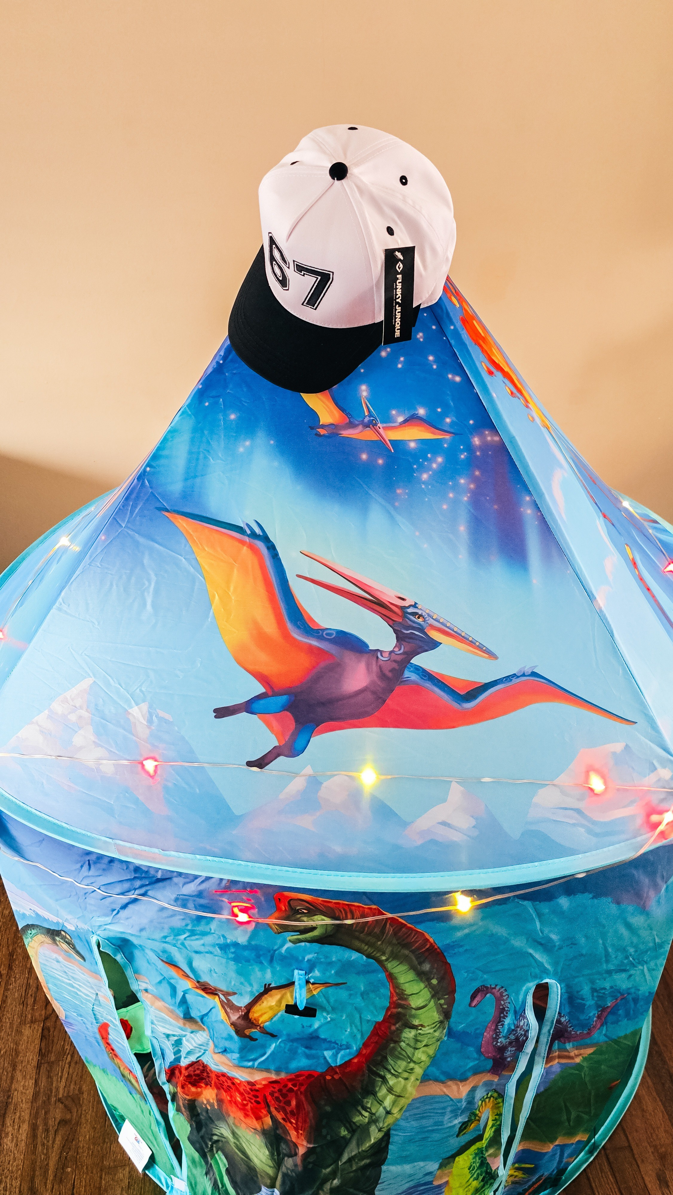 67 hat + dinosaur chaos = current vibe 😂My “67” Funky Junque hat is the perfect neutral grab-and-go staple everyone is talking about.And this dinosaur tent?? Lights, sounds, and figures included. The kids have been living in it. Zero regrets.Both linked here 🤍🦖

#LTKdayinmylife #LTKKids #LTKmomlife