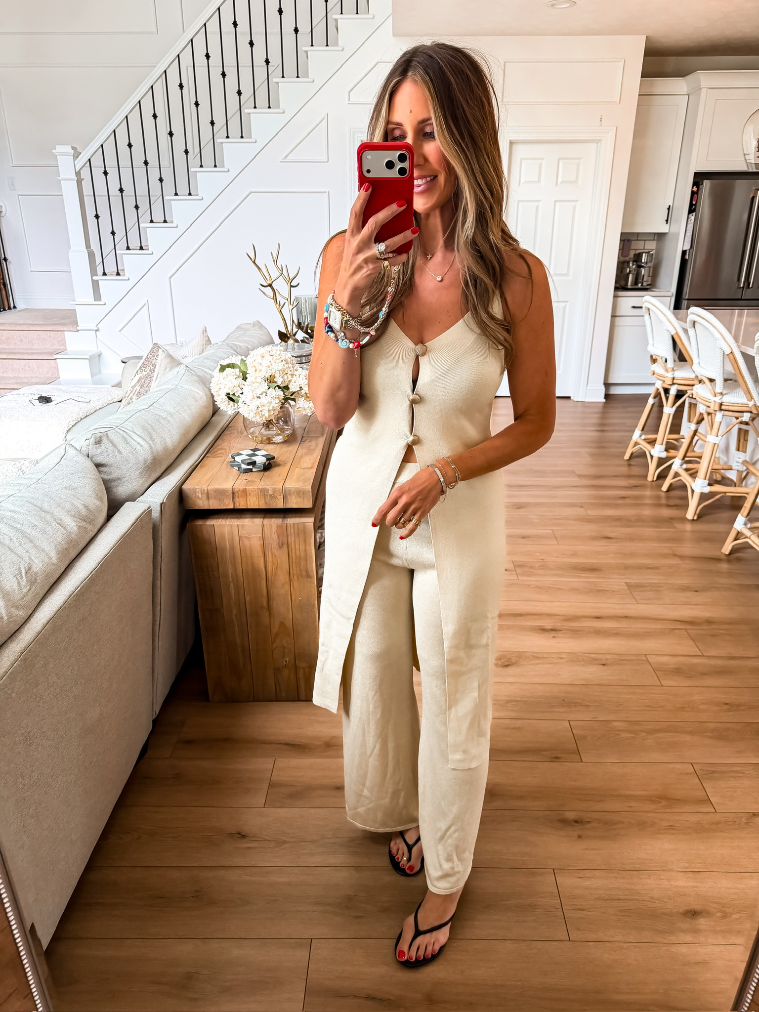 This set is so easy to throw on when you want to look put together without overthinking it. The longline button-front top gives it a little more shape than a basic tank, and the lightweight fabric keeps it comfortable even on the hottest days.

matching set, sleeveless top, button front top, wide leg pants, neutral outfit, summer outfit, vacation style, resort wear, lightweight set, effortless outfit, TheMomInStyle

#LTKootd #LTKOver40 #LTKTravel