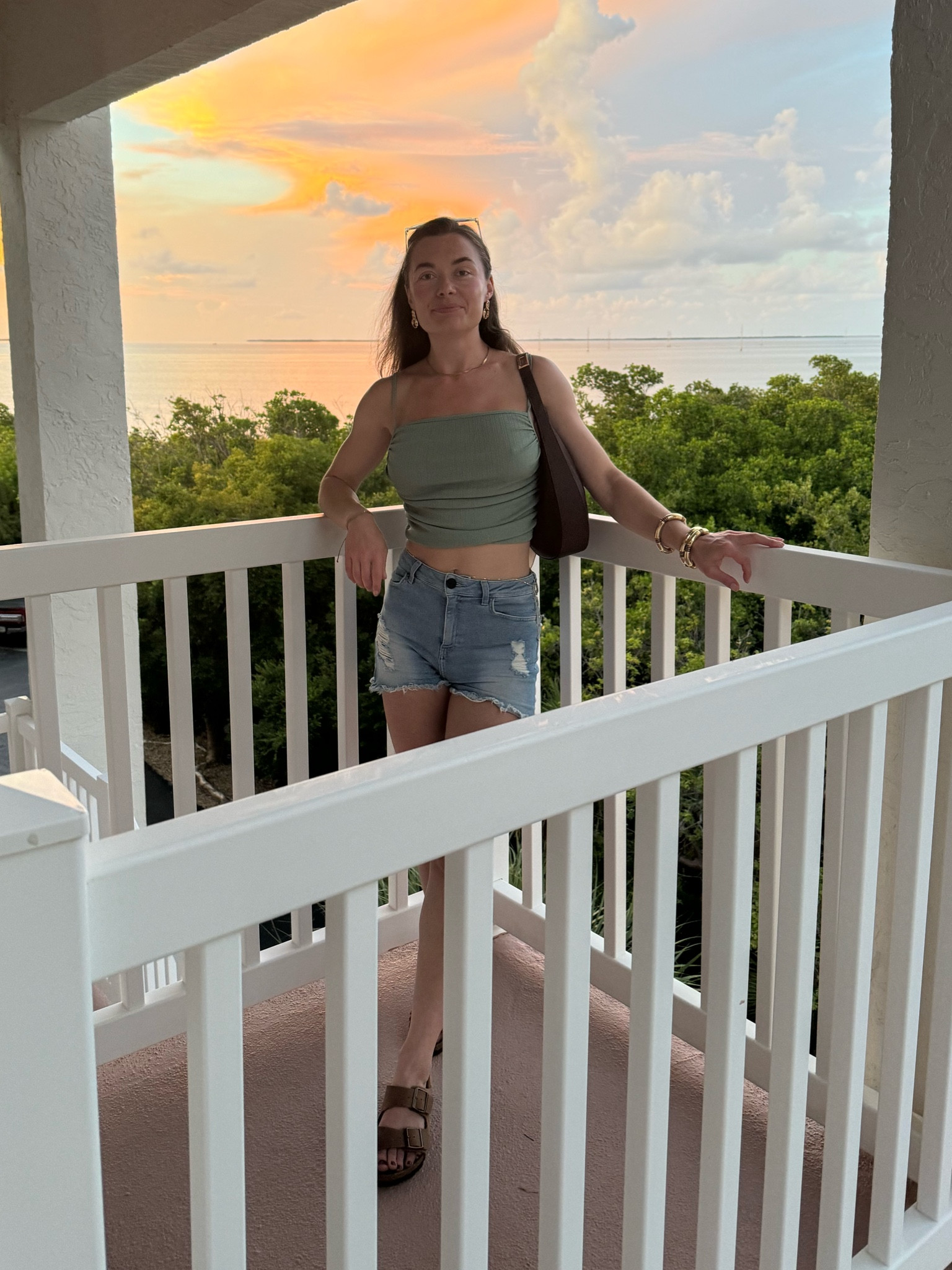 Sunset vibes 🌅 in this sage green crop top that seems to be the “it” color of the season!! 💚

Wearing a size small in the crop top which is a set from Cider (a must have. So comfy!) and a size 26 in the shorts from Levi’s. Birkenstock sandals are true to size and of course I paired this look with gold jewelry, TOMS sunnies 😎 and a brown crescent shape handbag.

#LTKStyleTip #LTKSaleAlert #LTKFindsUnder50