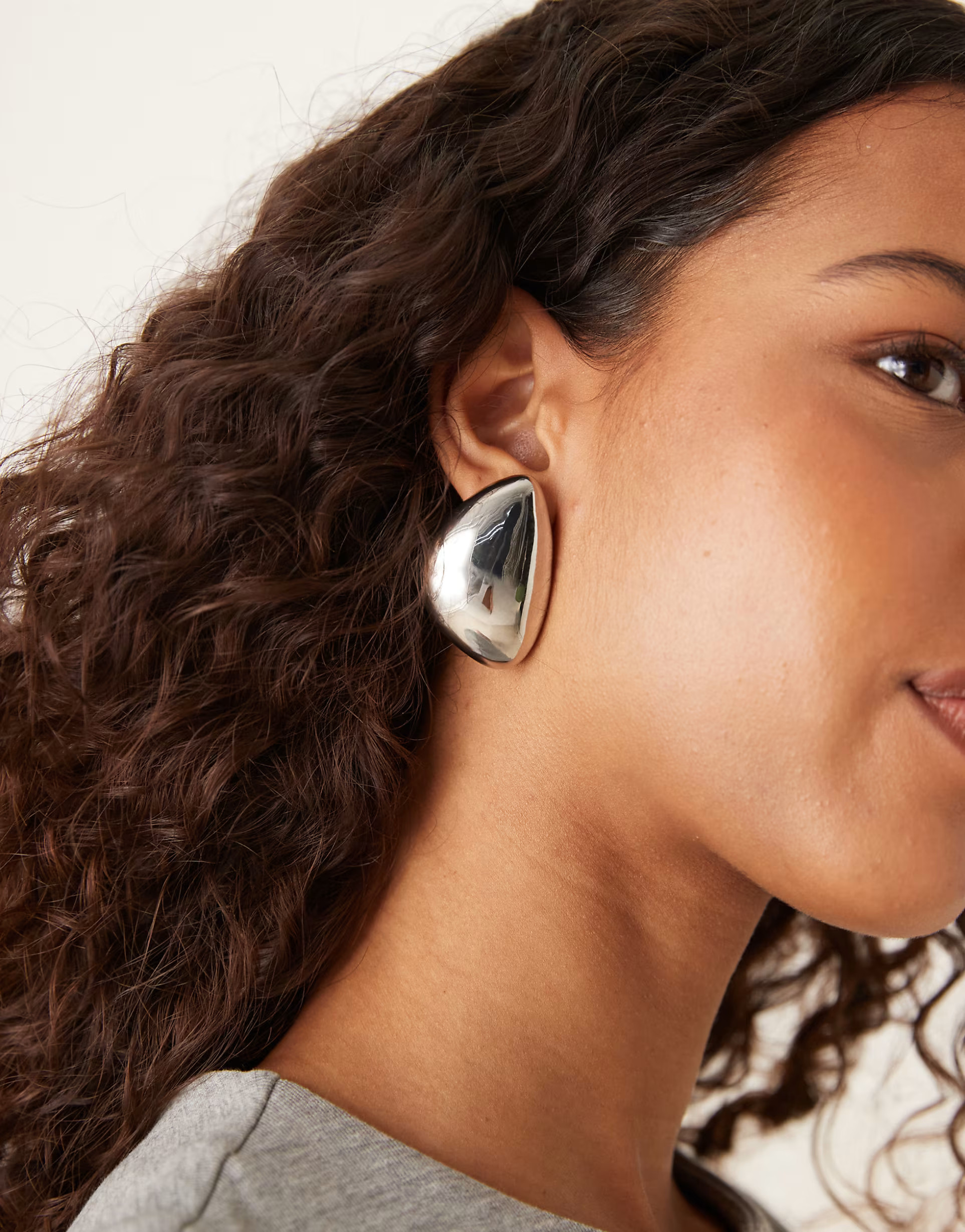 ASOS DESIGN large asymmetric stud earrings with domed shape in silver tone | ASOS | ASOS (Global)