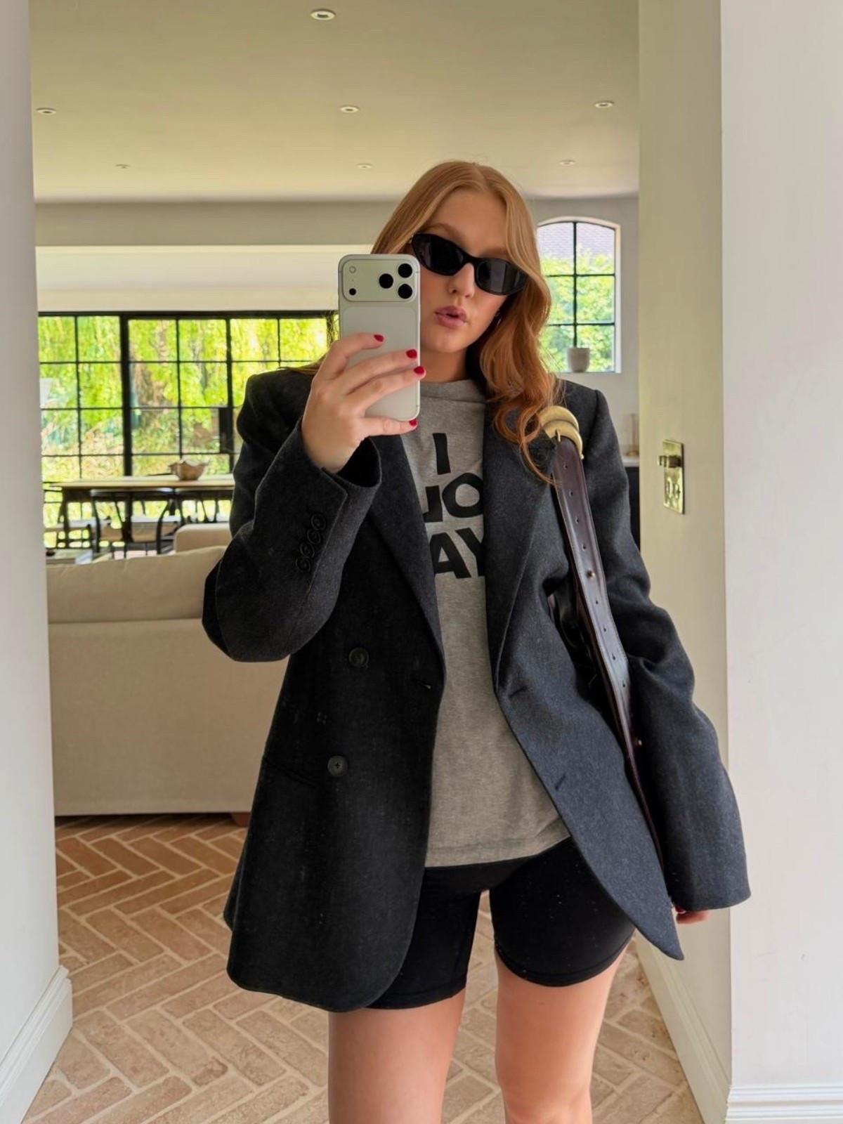 Stealing from my mums wardrobe to recreate Kaia Gerber’s model off duty look 🖤
blazer over tee, oversized blazer outfit, biker shorts outfit, smart casual street style, monochrome black outfit, blazer and shorts, off duty model style, NYC street style, elevated casual, graphic tee styling, layered basics, minimal street style, summer blazer look, biker shorts styling

#LTKspring #LTKeurope #LTKfitness