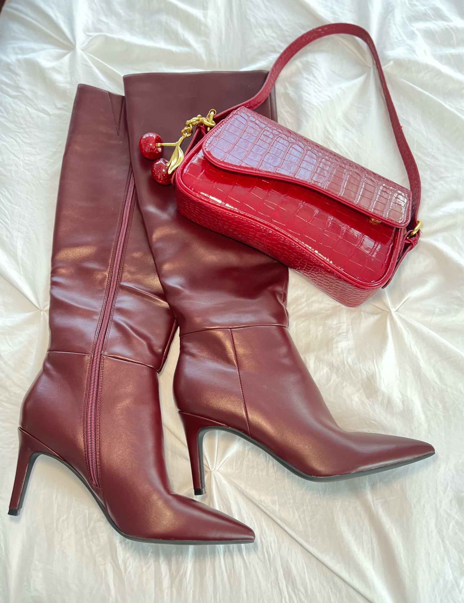 Amazon boots, purse & cherry bag charm

#LTKStyleTip #LTKSeasonal #LTKHoliday