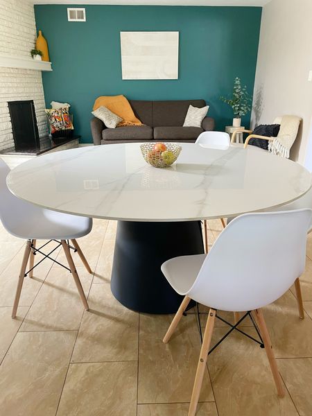 The perfect large round mid century table that seats 8. The top is stone but stain resistant and durable.  This table is under $1400! #rounddiningtable #midcenturydiningroom #marbletopdiningtable

#LTKhome #LTKFind #LTKstyletip