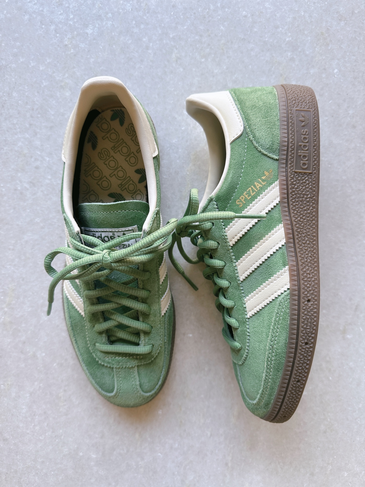 ADIDAS ORIGINALS GREEN HANDBALL SPEZIAL SNEAKERS, SSENSE, COMFY SHOES, SPRING / SUMMER, CASUAL OUTFIT, FARFETCH

#LTKtravel #LTKstyletip #LTKshoecrush