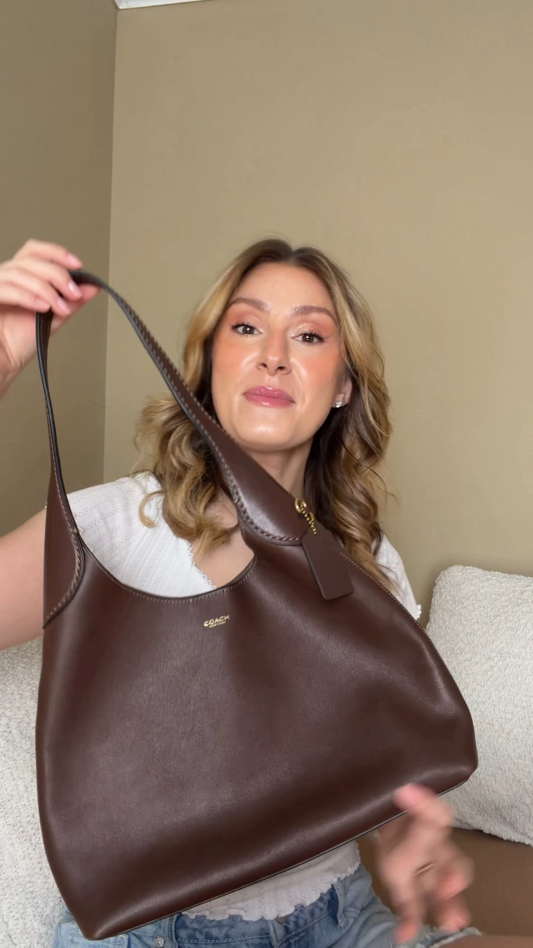 I’ve had my Coach Brooklyn 28 for almost a year now and here’s how she’s holding up! Comment SHOP & I’ll dm you the link to the bag & insert I use ♥️

The leather still looks amazing with no creasing and very little to no scratches! The corners look perfect except for one which makes me think it may have just scratched up against something. Even the bottom that I sit on the ground looks great. 
This is all without babying her or doing in leather care or conditioning!

If you’re looking for an affordable everyday leather bag that is amazing quality and will last you for years, then the Coach Brooklyn is an amazing option!