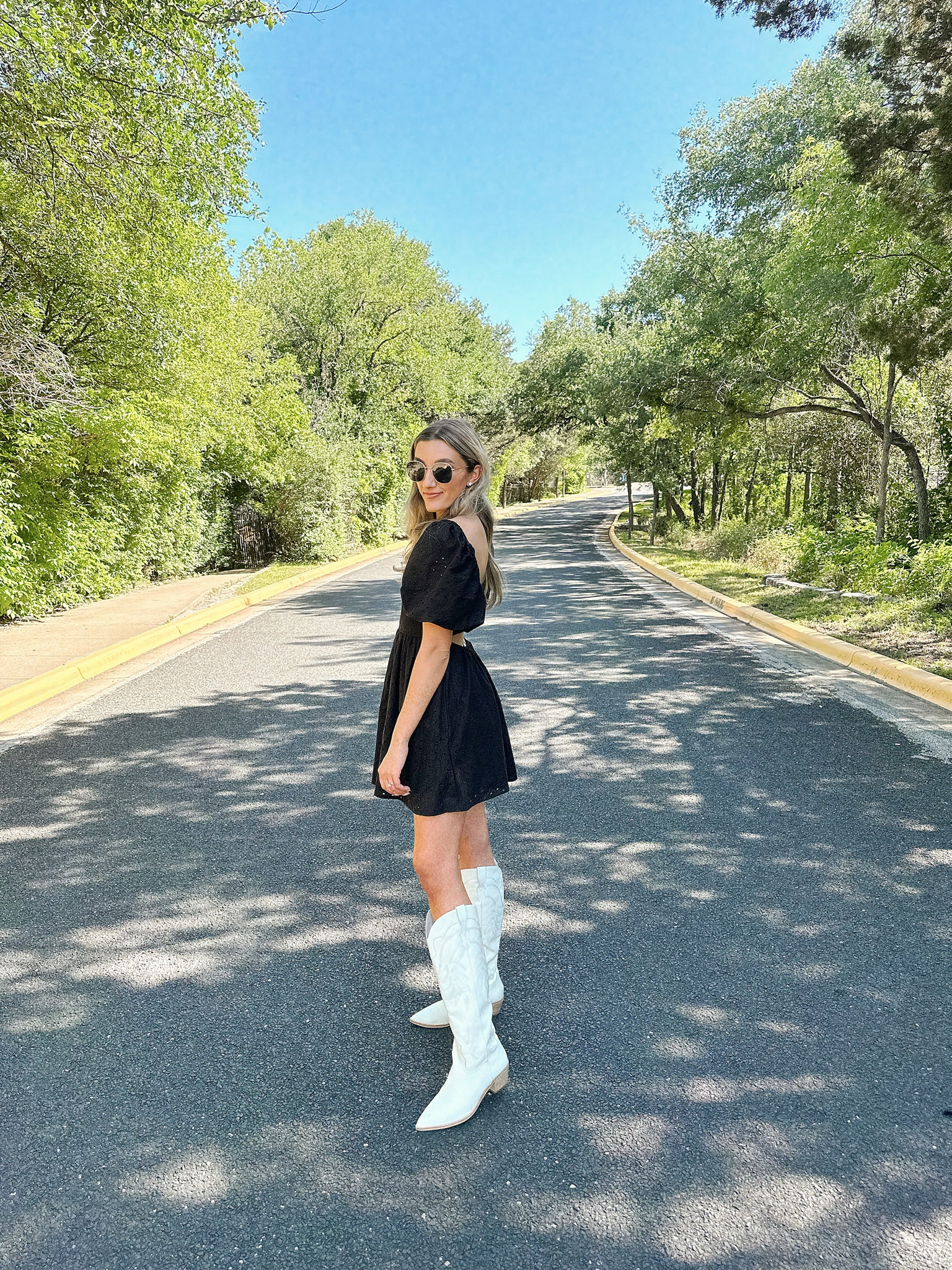 coastal cowgirl aesthetic 

white cowgirl boots, western style, black puff sleeve dress 

#LTKunder100 #LTKunder50