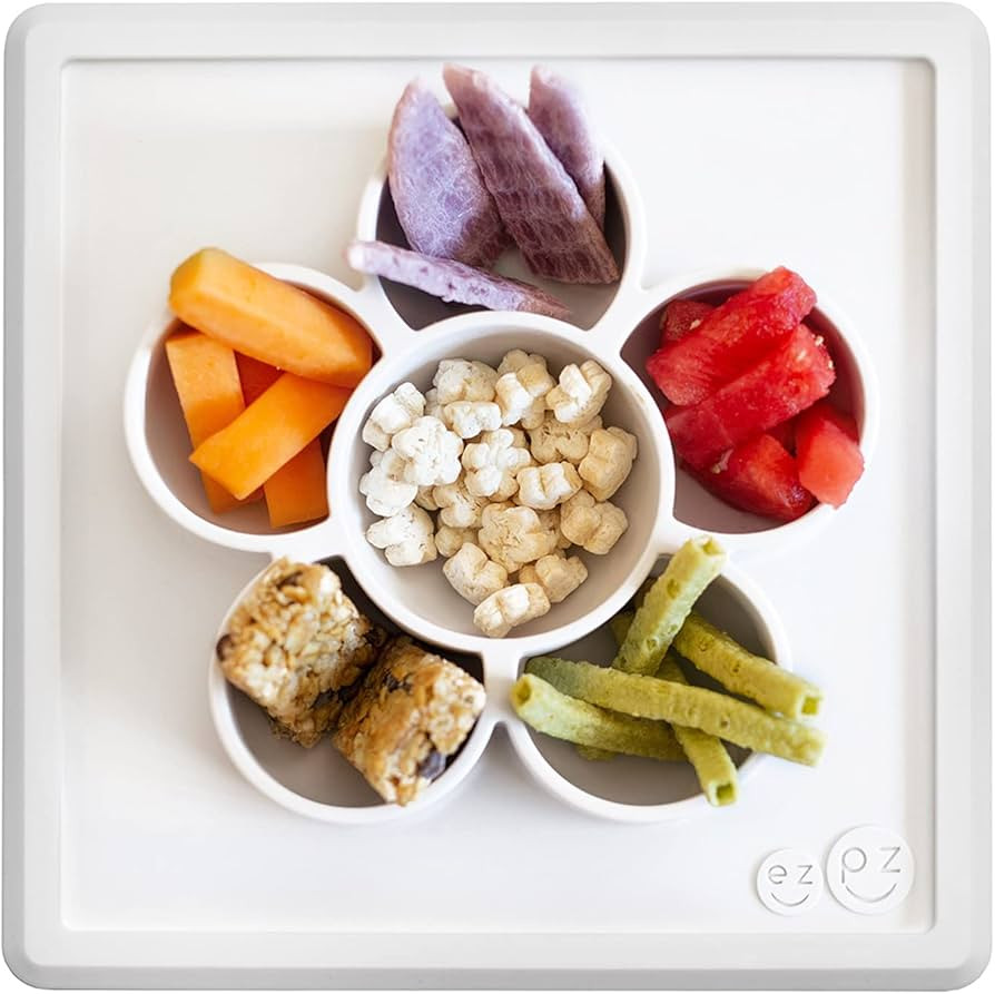 ezpz Mini Play Mat - 100% Silicone Suction Flower Plate with Built-in Placemat for Infants + Todd... | Amazon (US)