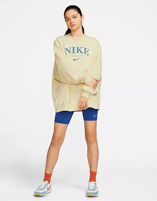 Nike Essential Fleece oversized retro logo crew neck sweatshirt in cream | ASOS | ASOS (Global)