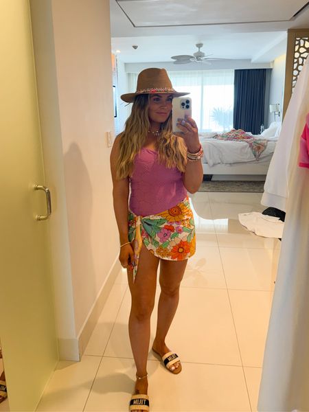 Vacation outfit! This swimsuit is from Beach Riot and super comfy!!! This sarong isn’t available anymore but I linked something similar that would be cute with this swimsuit! 

You can use code BrittH20 on the seashell hat! 