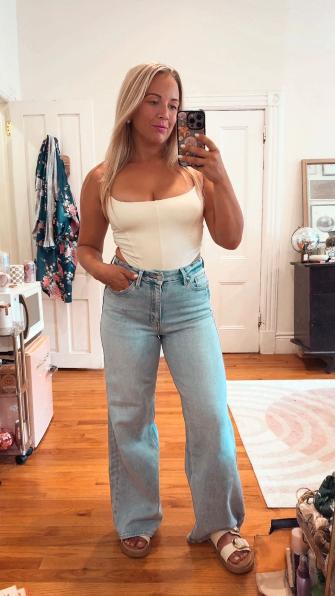 Everyday cute summer to fall transitional outfit! 🤍

Really into my new palazzo jeans - they are my first pair. Wearing a size 26, I had to hem the jeans. Stretch denim & super comfortable! 

🫶🏻 my top is $6.99 and comes in a few different color options. Versatile and you can pair with a skirt too. 

🎉 My shoes are Birk dupes! Raffia white and cream option that are the cutest for summer. 

#LTKStyleTip #LTKSaleAlert #LTKFindsUnder100
