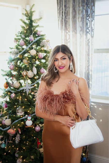 This Feather trimmed slip dress is so chic and fits a curvy body! I’m wearing a size 12. Also sharing other options that are midsize friendly! 

Midsize festive look / Christmas outfit / family photo / cocktail dress / fall wedding guest dress 

#LTKSeasonal #LTKwedding #LTKHoliday