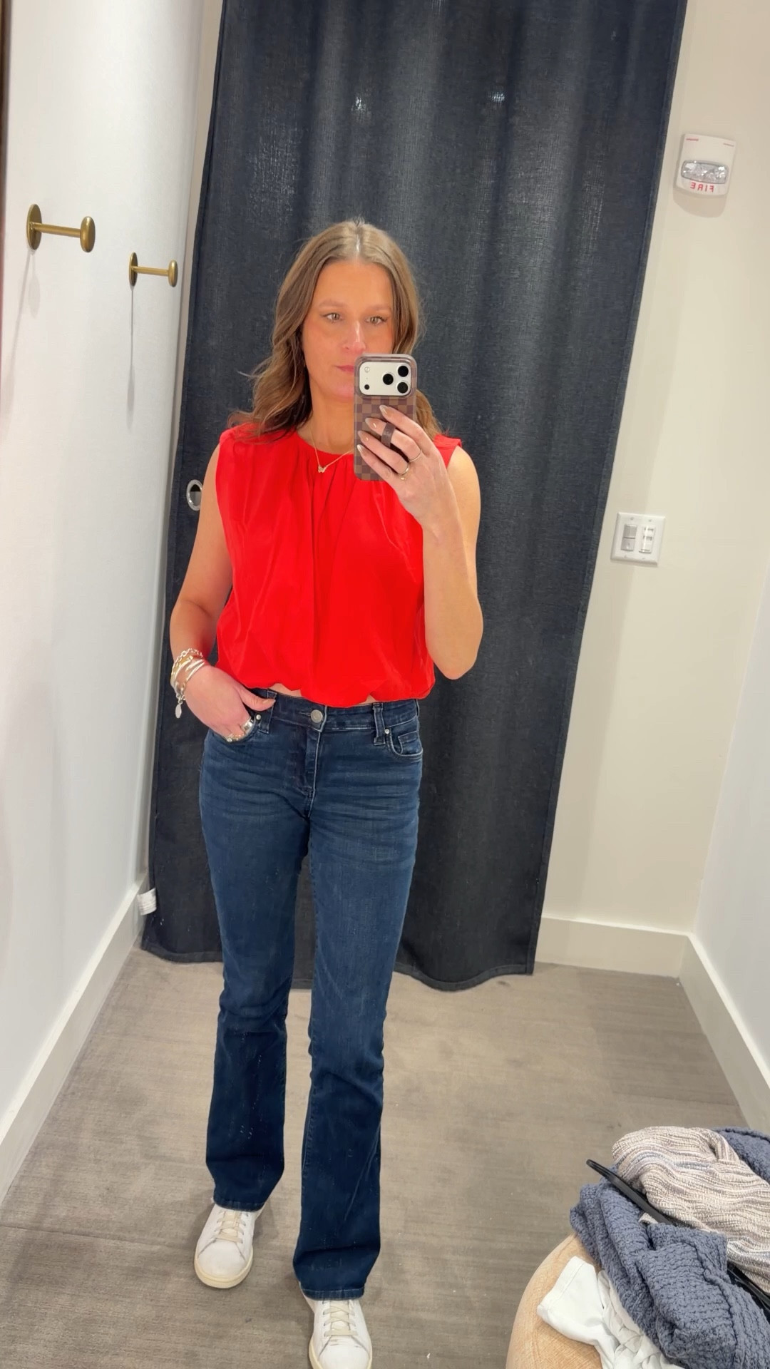 The bubble hem top is so cute!  Style it with jeans, shorts and skirts. It is slightly cropped and comes in white, red and navy. I’m in a size small. 

#LTKOver40 #LTKspring #LTKspringtrends