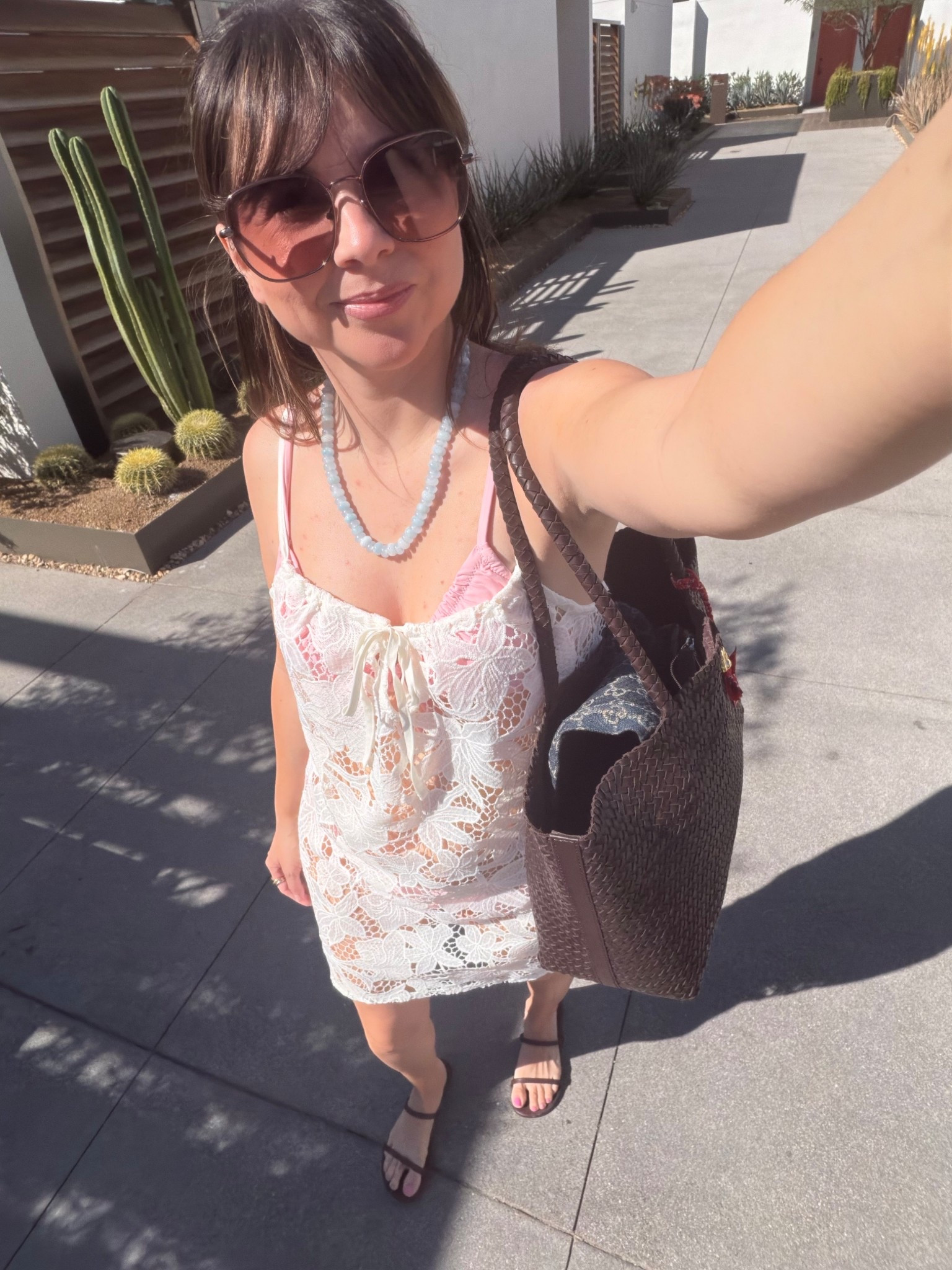 A lace mini dress that actually works for petites (I’m 5’2). Styled with simple black sandals and a woven tote for an easy polished outfit.

Xs cover up 
Bikini XS 

Comment SHOP below to receive a DM with the link to this post on my LTK ⬇ https://liketk.it/5Zf4L #ltkswim #ltkootd