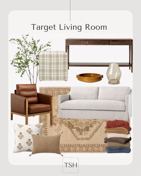 Target living room favorites. Upholstered ottomans, faux leather chair, console table, area rug, throw pillows, throw blankets  

#LTKSeasonal #LTKhome #LTKfindsunder100