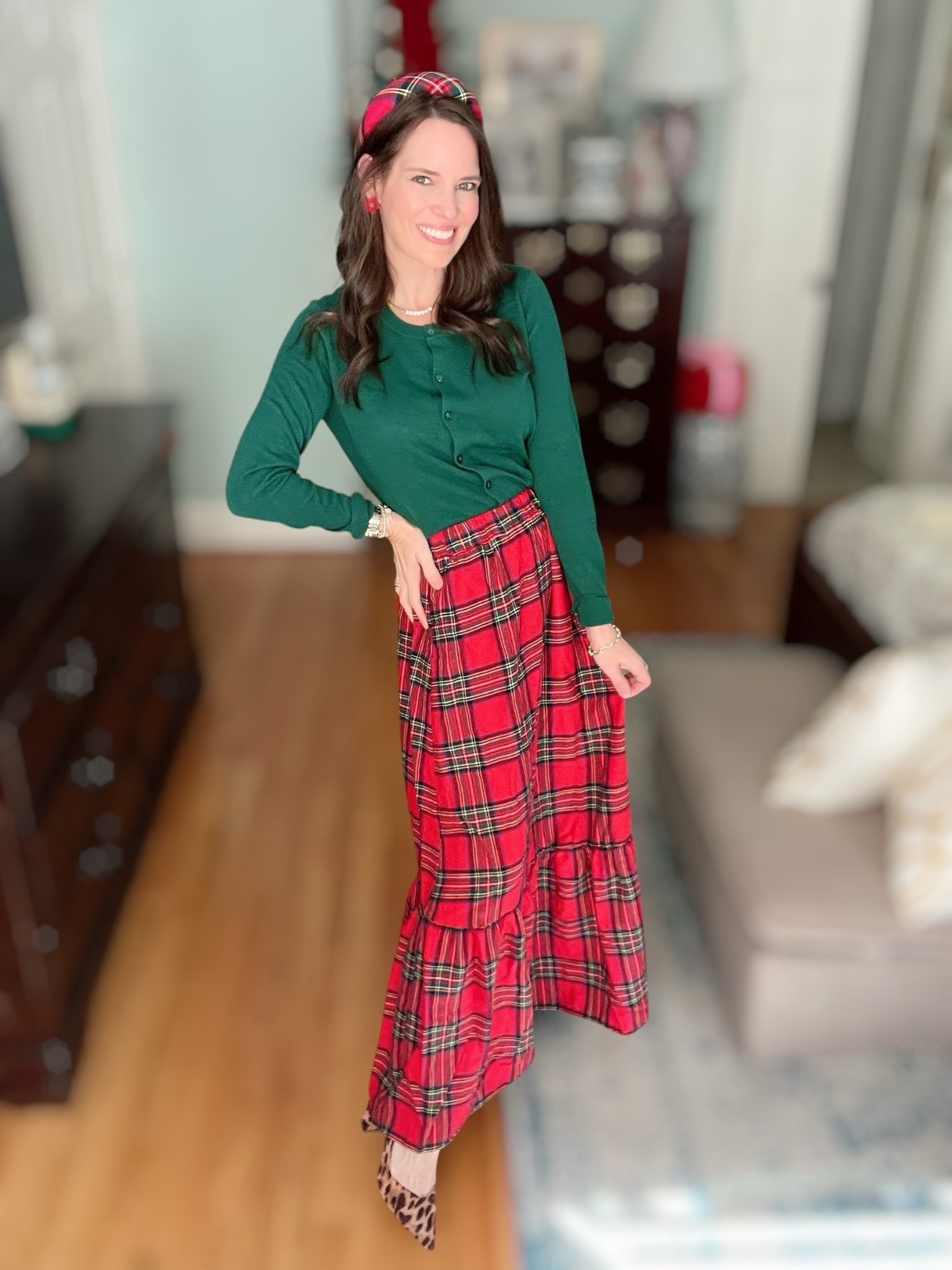 Holiday plaid but make it classic + preppy 🎁 I paired this soft green button-up cardigan with a red plaid ruffle maxi skirt for the most charming Christmas outfit moment 🎄 The tartan headband and flower stud earrings add the sweetest festive touch, and the leopard heels keep it fun + unexpected (holiday patterns can mix!) Wearing XS/S in everything linked. Such a cute look for holiday parties, Christmas Eve, church, school functions, cookie swaps, photos, or festive brunch 🎅🏼❤️

⸻

Outfit Details:
💚 Green Cardigan — cozy, lightweight, and easy to dress up or down
🎄 Red Plaid Tiered Maxi Skirt — twirl-worthy + comfortable
🎀 Tartan Padded Headband — the cutest holiday accessory
🌺 Red Flower Stud Earrings — small pop of color that ties everything together
🐆 Leopard Pumps — fun, chic neutral with personality
✨ Gold Necklaces + Bracelets — everyday sparkle

⸻


holiday outfit ideas • Christmas outfit inspiration • festive holiday style • plaid skirt outfit • green cardigan outfit • preppy Christmas style • Christmas brunch outfit • holiday photo outfit • easy holiday outfit • classic Christmas fashion • tartan style • coastal grandmother Christmas • southern holiday style • timeless holiday wardrobe • affordable holiday outfit


#LTKFindsUnder50 #LTKFindsUnder100 #LTKHoliday

#LTKFindsUnder50 #LTKHoliday #LTKCyberWeek
