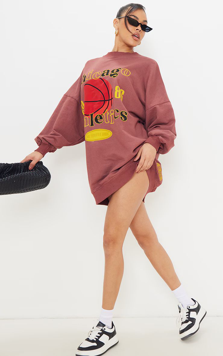 PRETTYLITTLETHING Burgundy Chicago Graphic Oversized Sweat Sweater Dress | PrettyLittleThing CAN