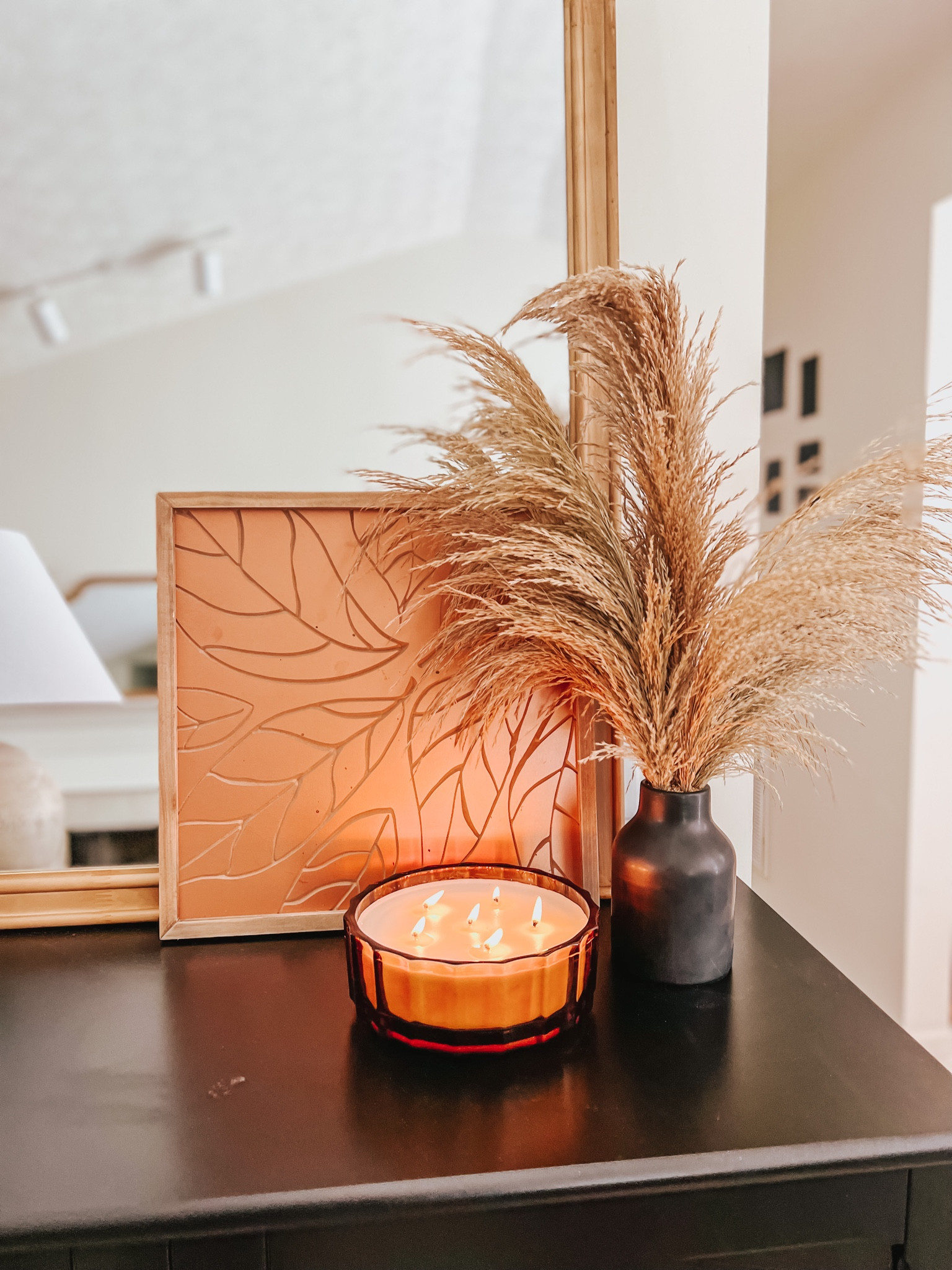 Fall entry table 


Easy fall decor | autumn colors | pampas grass | black vase | orange candle | home decor | console styling 



#LTKhome #LTKSeasonal