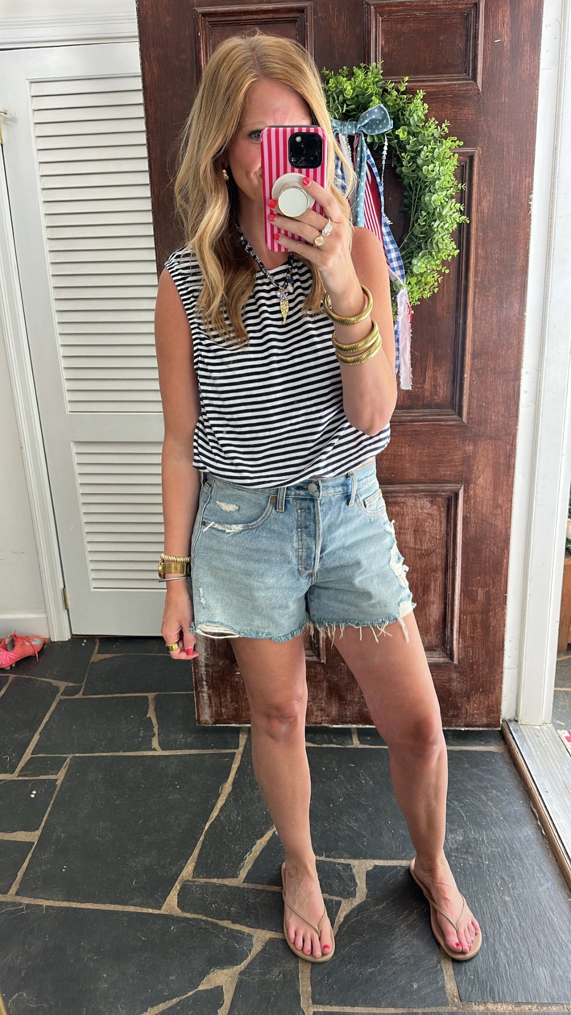 The key to the 90s baggy shorts is sizing up one! I’m in an 8. And this bubble hem tank is so cute! Size M