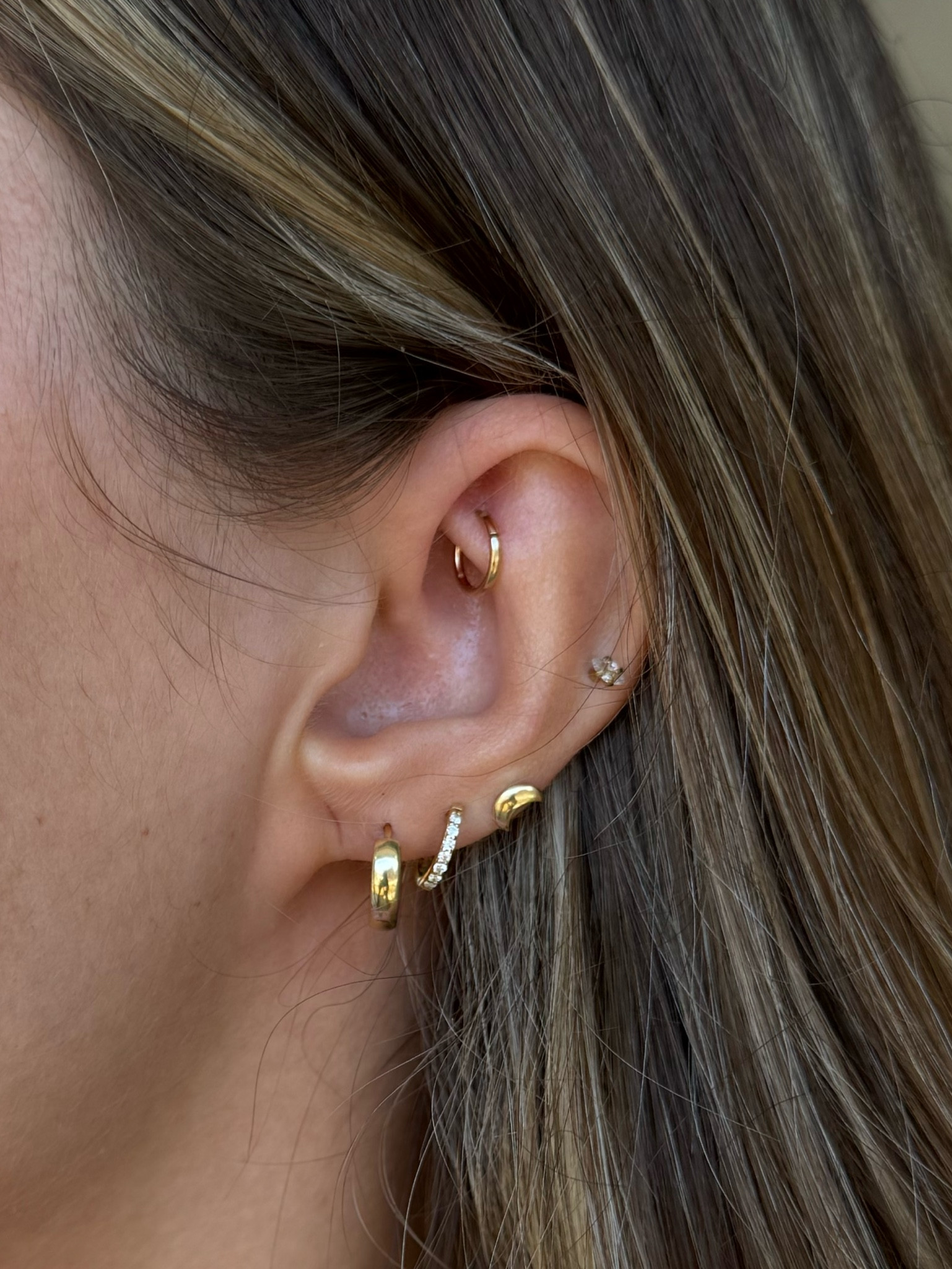 my everyday earrings! 💗 I never take these out & I have sensitive ears & they don’t bug me! I have small ears and am able to sleep n workout in these n they never bug me ☺️ the hoop in my room piercing is from body art forms, which my piercer recommended, but I can’t link it! 