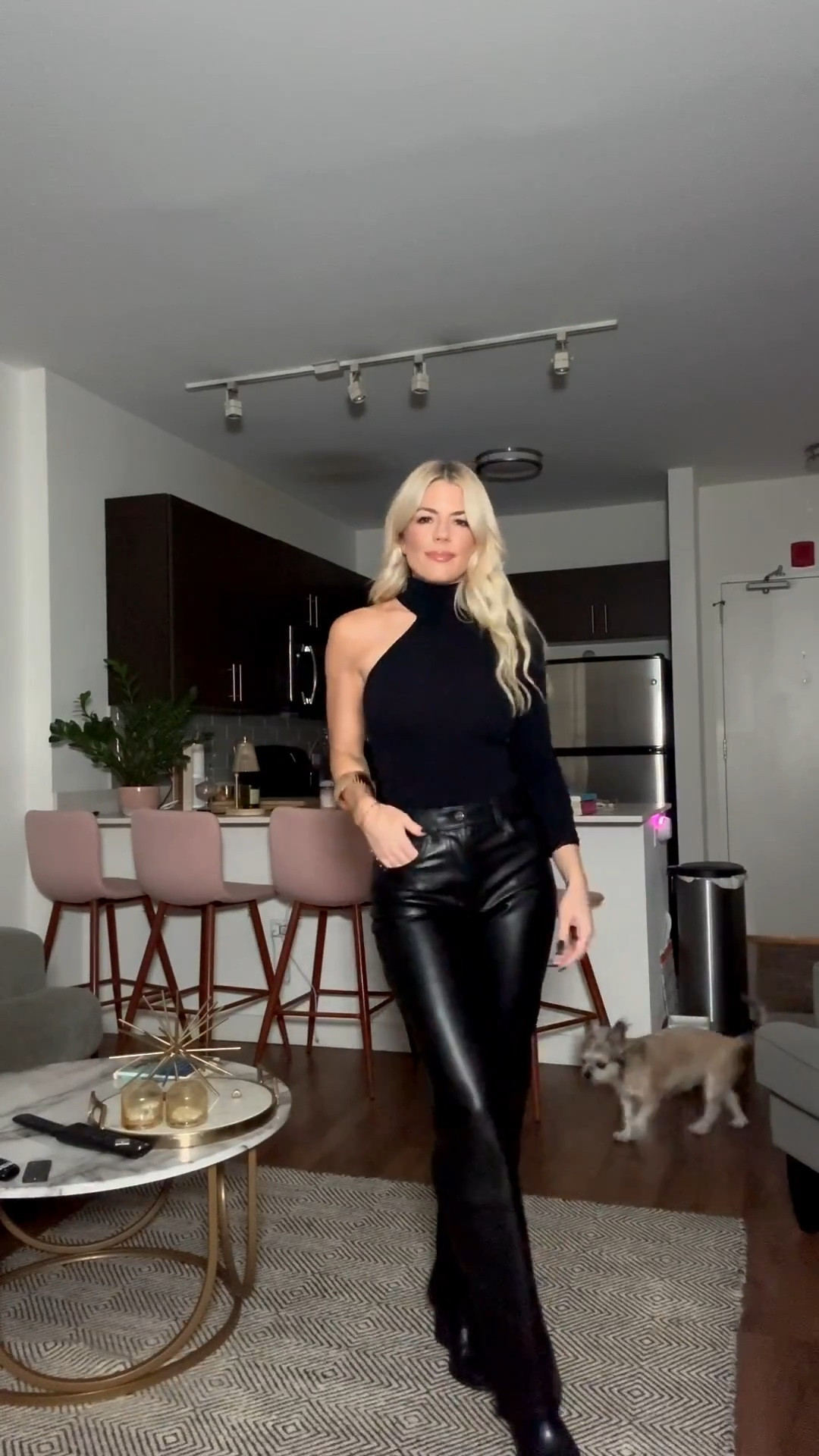Friday night out! All black with leather pants and a one shoulder turtleneck bodysuit. Throw on a shiny cropped puffer on top! 