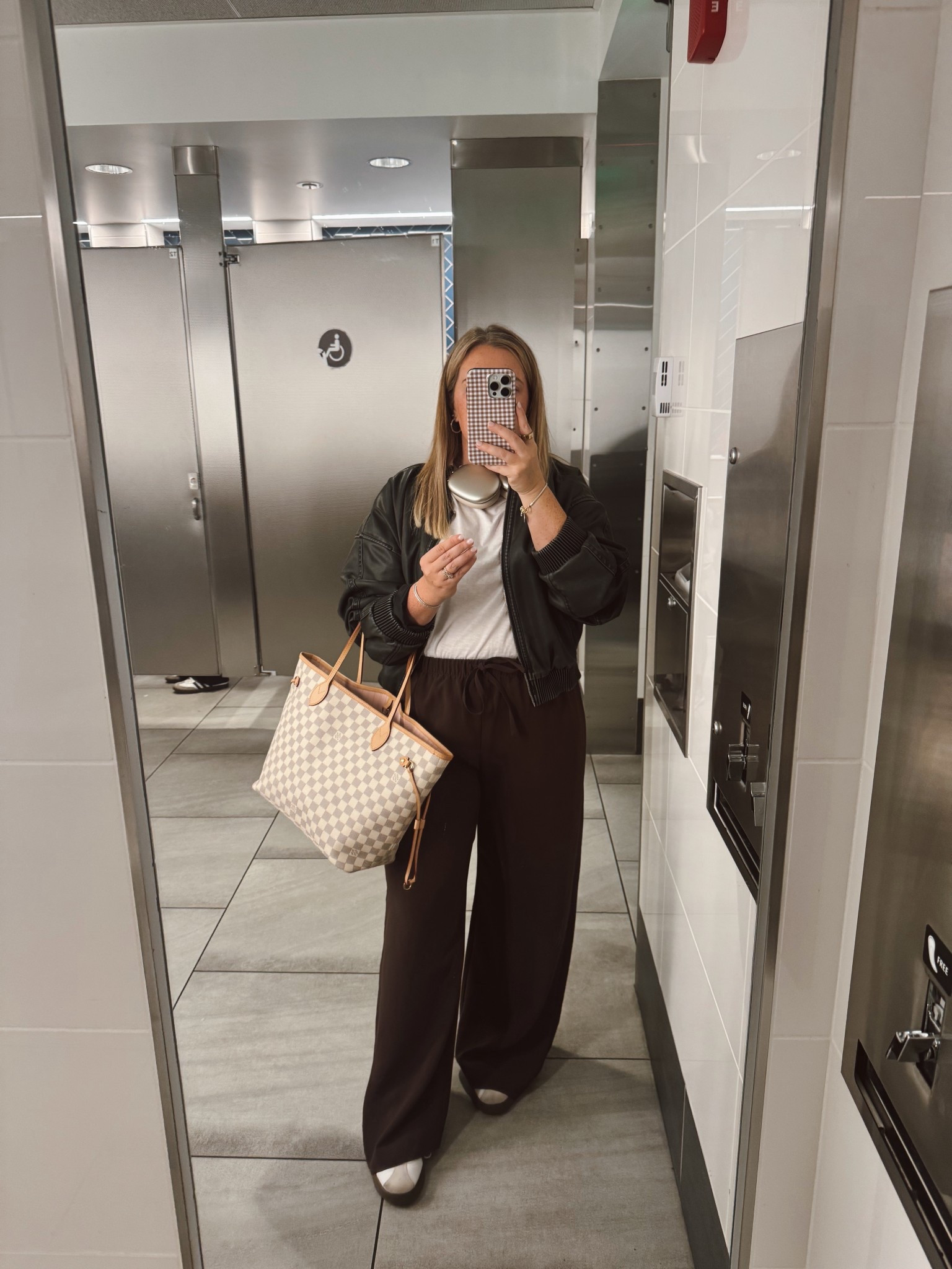 Airport fit check. Size large in Aritzia pants. Worth the splurge. Feels like an elevated lounge pant, but wears like the  perfect work and travel pant. I own them now in 4 different colors. 

#LTKTravel #LTKPetite #LTKMidsize