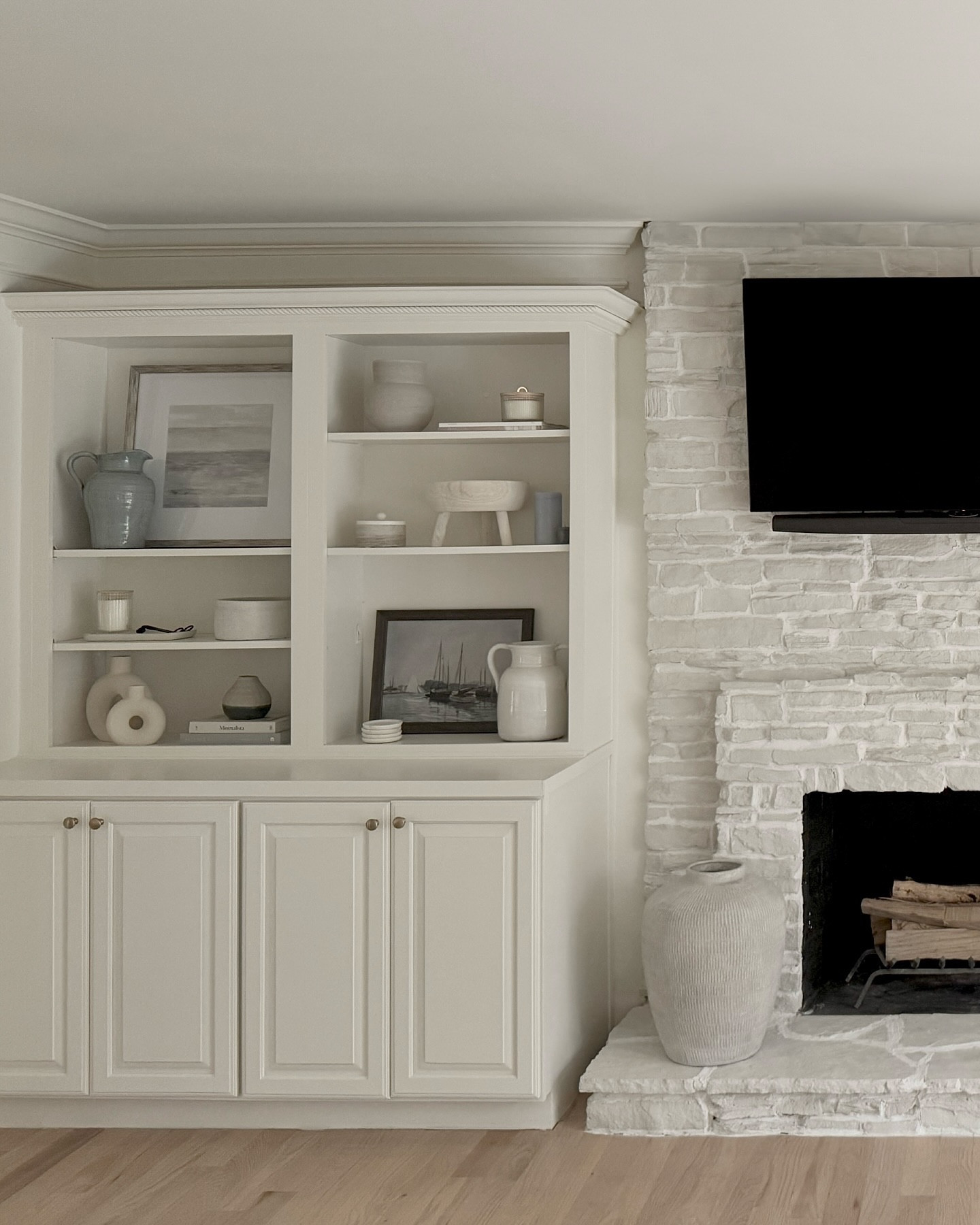 SHELF STYLING 101: styling shelves can be daunting especially when you have large built ins. Here are my no fail tips for getting started, but remember these shelves can evolve and change over time so if something doesn’t feel right swap it out with other items until it does! 

1. Always start with completely empty shelves, even if you’re just rearranging for the season or adding a few new pieces 
2. Place large items first - frames, vases, baskets, etc. and balance them throughout the shelves 
3. Start layering in your medium pieces - books, smaller frames, trays. Step back every once in a while to look at the bigger picture. If something doesn’t feel right remove it for now and you’ll probably see where it fits in later 
4. Add in smaller decorative objects last, making sure to keep the balance of height, color, and tone
5. Pay attention to scale. Make sure you place appropriately sized objects in each space. For example, I placed a large frame in the top left large space and then layered in front of it. It wouldn’t look right if I only had smaller decorative items in such a large space right? 

Do you love or hate styling shelves? Let me know in the comments! 

 #shelfstyling #shelfstyle #builtinshelves #builtinstyling #shelfdecor #shelfdesign #interiordesign #interiorstyling #shelfie #shelvesdesign #neutraldecor