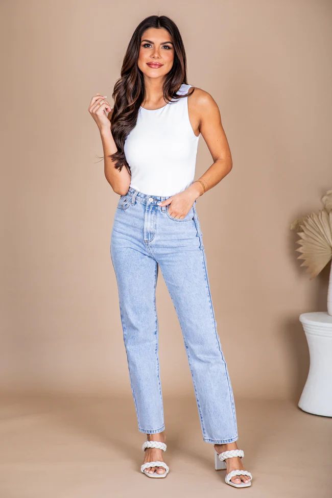 Details




Light wash straight leg mom jeans 
Fabric has no stretch 
Button and zipper closure... | Pink Lily