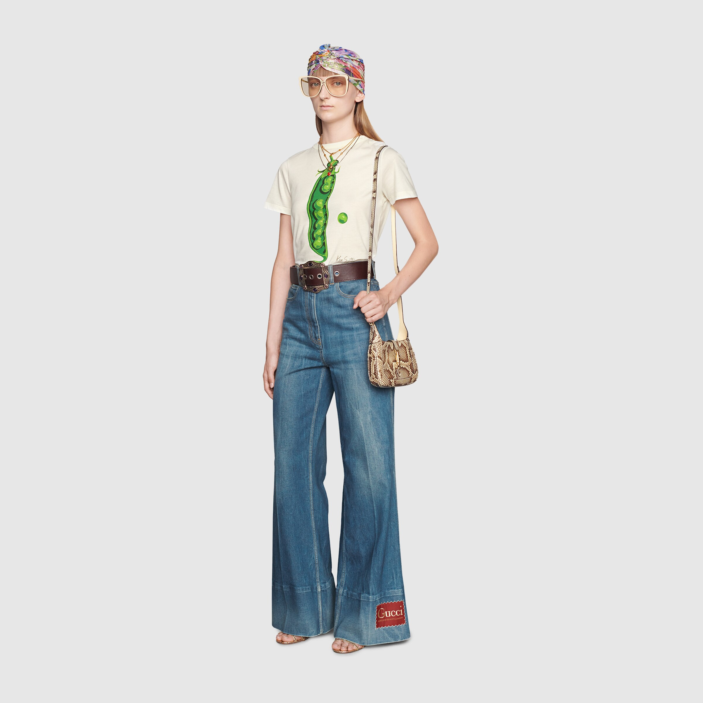 Washed denim flare pant with Gucci label | Gucci (CA)