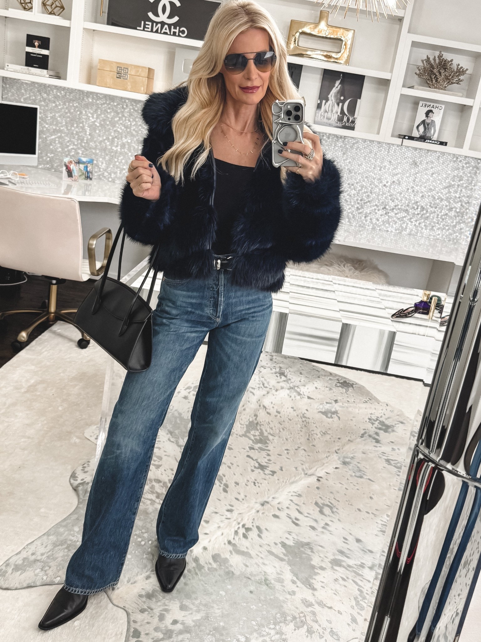 Sharing today’s outfit of the day — a polished, comfortable look I always reach for this time of year. This navy faux fur jacket adds instant sophistication, while the ultra-stretchy Quince long-sleeve bodysuit and dark-wash Citizens of Humanity jeans keep the outfit effortless and flattering. Finished with classic black ankle boots, a Madewell belt, and my favorite black Quince handbag for an easy, pulled-together fall outfit featuring Jackets, Denim, and timeless staples.

I’m wearing a size XS jacket, XS bodysuit, size 24 jeans, and everything fits true to size. 

 #LTKootd #LTKSeasonal #LTKOver40