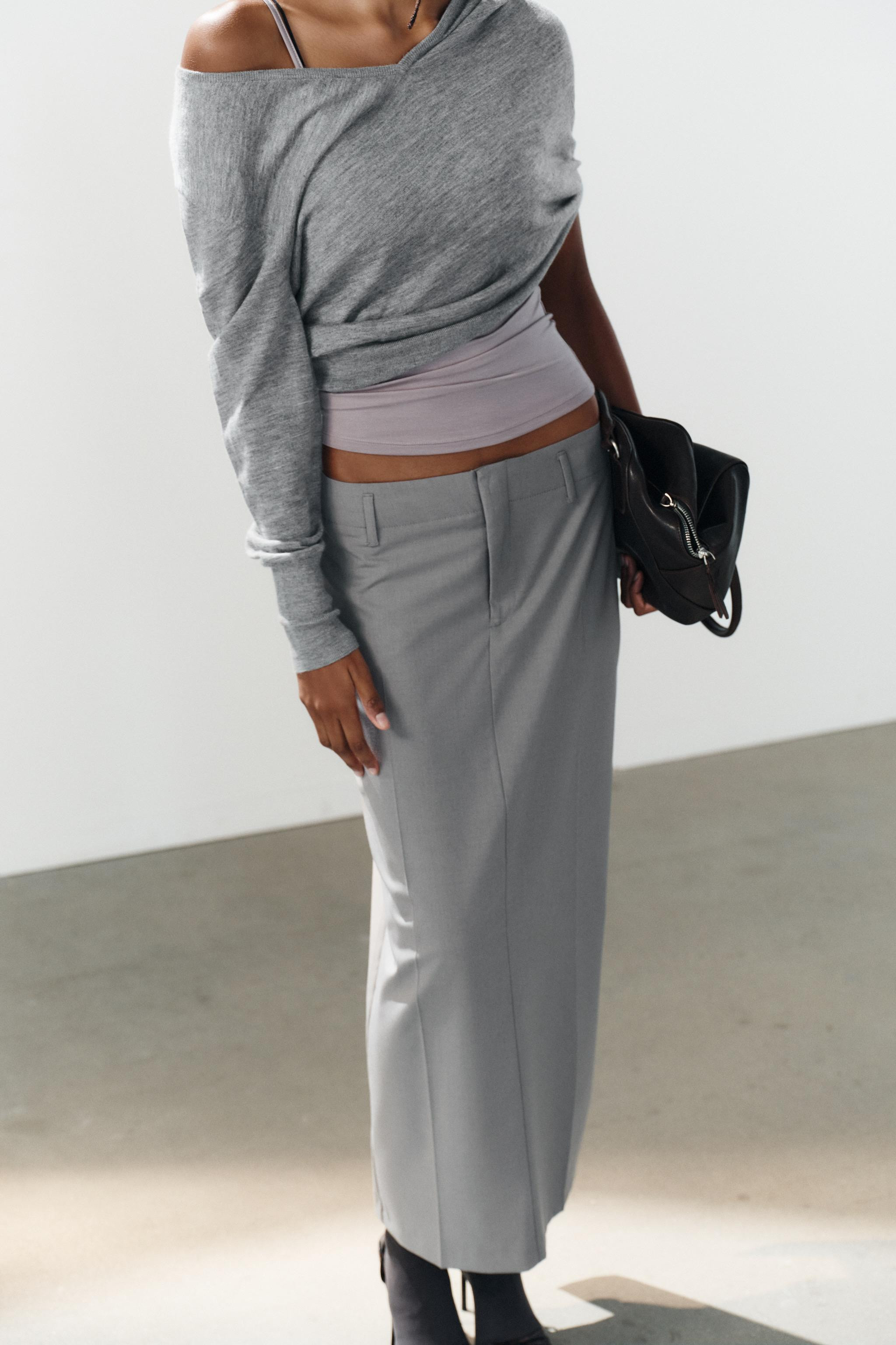 Mid-waist midi skirt with belt loops. Features side seam pockets, a decorative welt pocket at the... | Zara UK