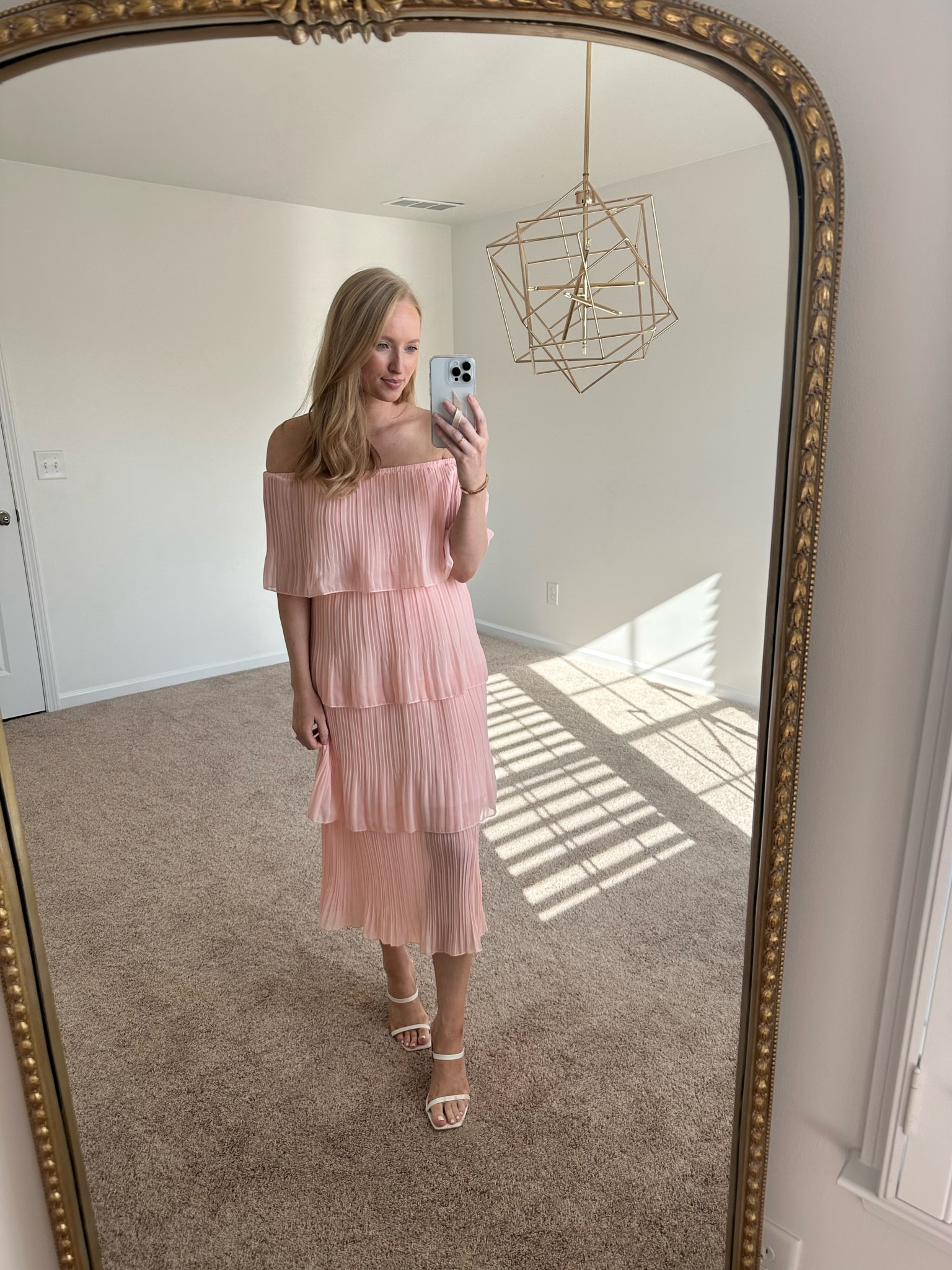 Affordable wedding guest dress with a tiered pleated detail throughout. Loving the off shoulder fit! Pair with a neutral handbag and heels to complete your look  

#LTKunder50 #LTKSeasonal #LTKwedding