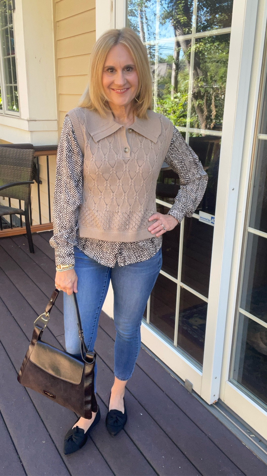 Transitional fall style made easy 🍂 This sweater vest blouse is the perfect layered look without the bulk. I paired it with my favorite skinny jeans (so glad they’re “back”—but did they ever really leave?) and classic pointy flats from Amazon for an effortless chic vibe.
Topped it all off with my new leather + suede handbag from Italy that adds just the right touch of luxe. ✨
Would you wear this combo for fall? 



#LTKOver40 #LTKStyleTip #LTKFindsUnder100