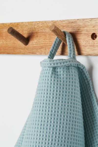Wooden hanger with three hooks. Two holes for hanging. Screws not included. Depth 0.5 in. Height ... | H&M (US + CA)