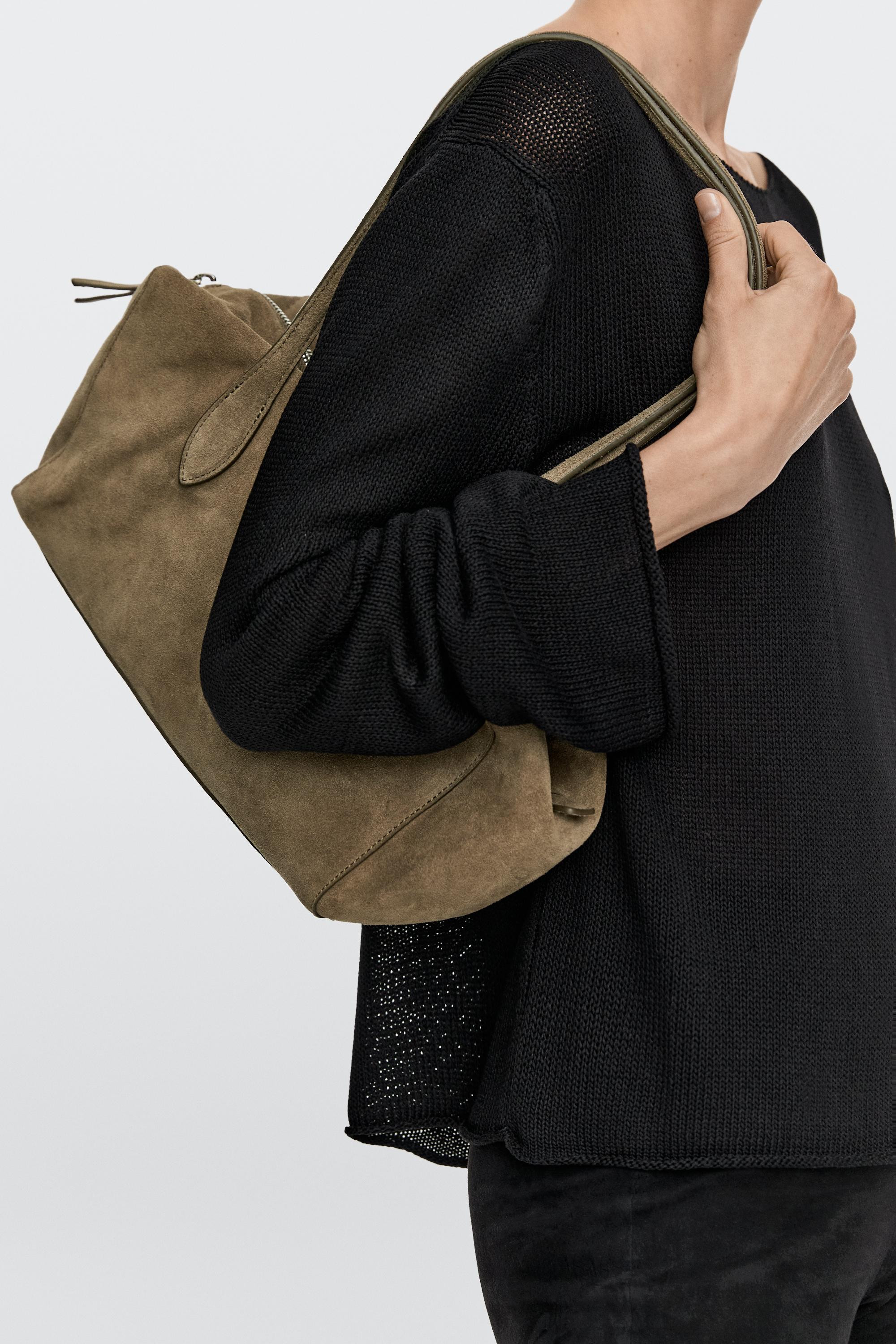 VIEW LOOK
Split leather west satchel bag

 £169  Colour:  Mole Brown  Add to basket | Massimo Dutti UK