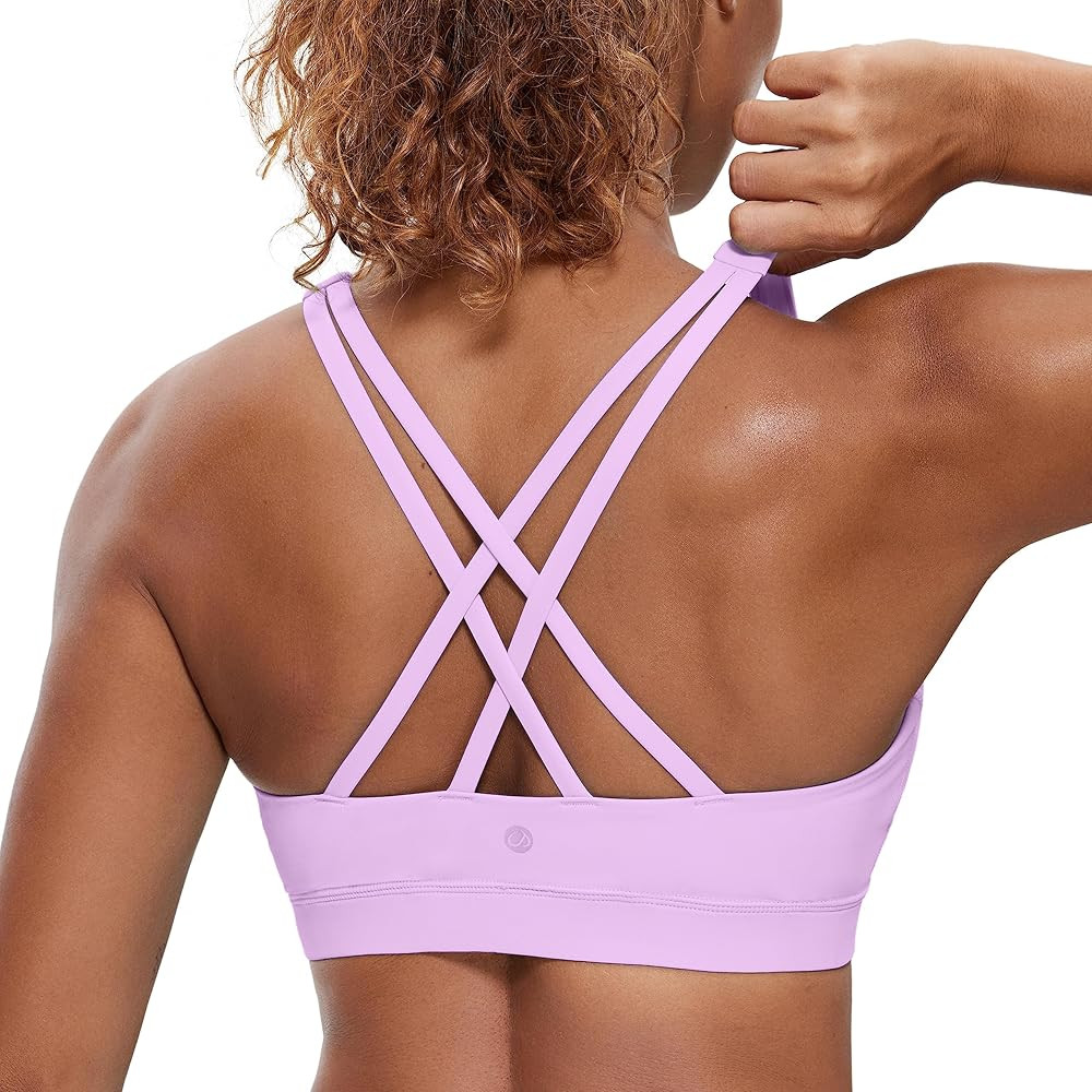CRZ YOGA Women's Strappy Sports Bras Fitness Workout Padded Yoga Top Criss Cross Back Cami | Amazon (US)