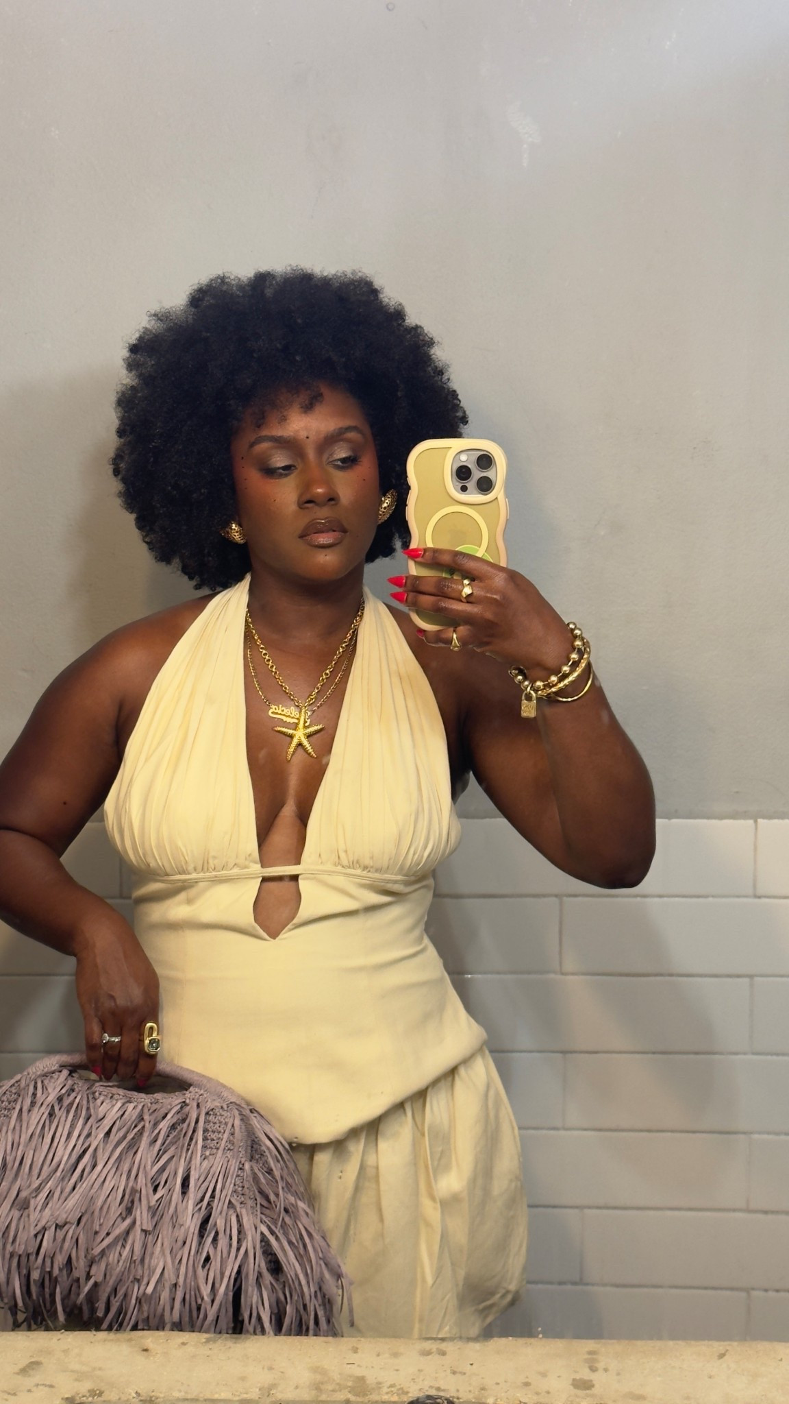 Butter yellow bubble shorts and halter with raffia bag