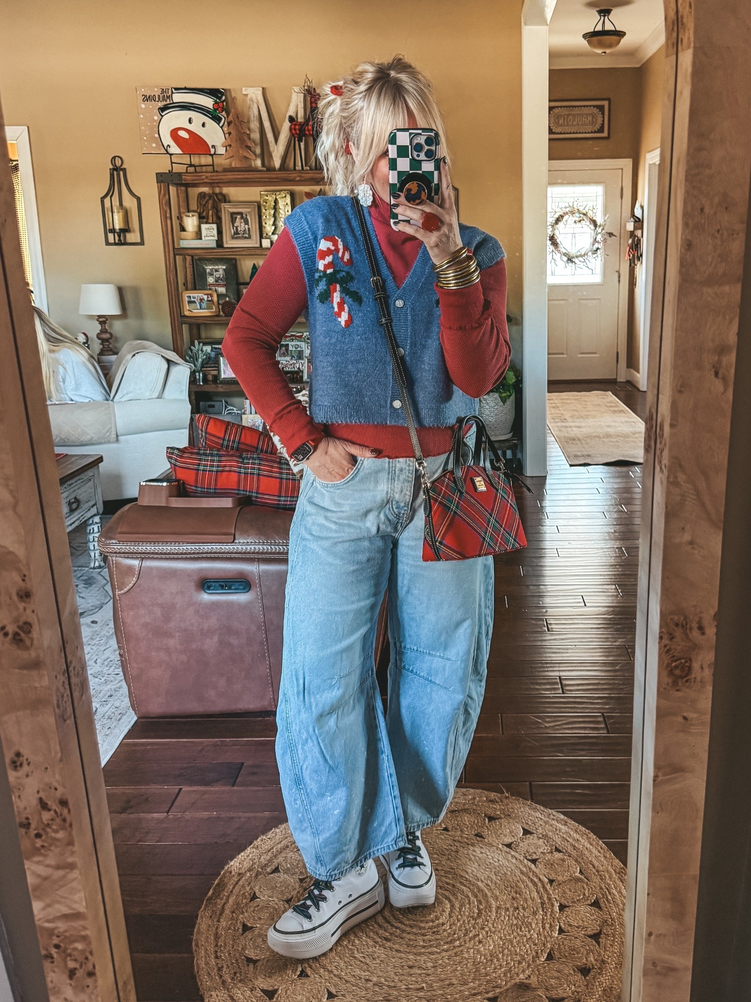 My outfit today! 🎄♥️ 
Love this sweater vest. In a size medium 
My turtleneck is a size medium too. I size down one in these barrel jeans. 
 

#LTKootd #LTKHoliday #LTKOver40