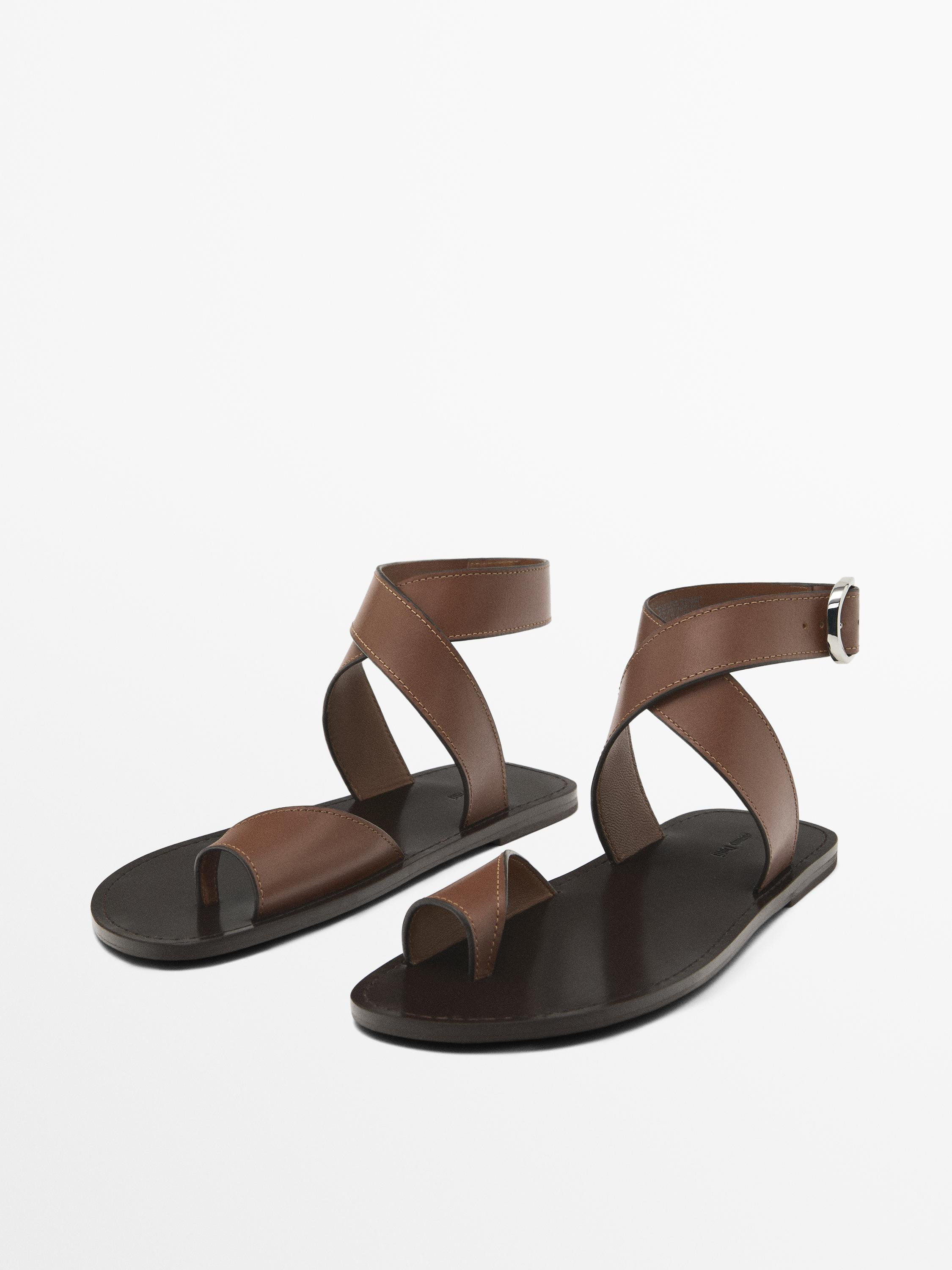 Crossover sandals with toe divider
    
 $160.00  Add to basket  SELECT SIZE | Massimo Dutti US