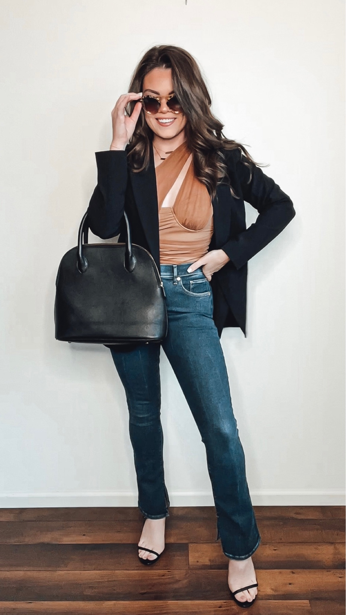 Express black blazer and split hem skyscraper denim paired with brown bodysuit and black accessories 

#LTKworkwear #LTKSeasonal #LTKstyletip