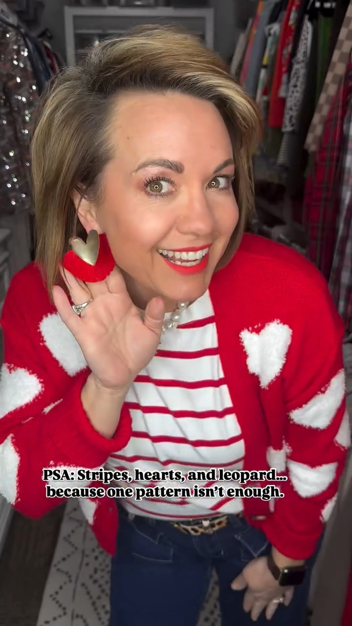 PSA: Stripes, hearts, and leopard… because one pattern isn’t enough.

Looking for a fun and flirty Valentine’s Day outfit? Here’s how I styled this bold and playful look:

I started with high-waist cropped jeans for an effortlessly chic base. Layered a red-and-white striped tank under a heart-print cardigan for that ultimate Valentine’s vibe. Then, I mixed in some leopard print details with my belt and embellished handbag to spice things up—because pattern mixing is always a win! Red flats added the perfect pop of color, while fun jewelry tied everything together.

Pattern mixing is your secret weapon for making any look more interesting—don’t be afraid to experiment! Are you a fan of mixing prints like stripes and leopard? Let me know below! ❤️

✨ Follow for more outfit inspo, styling tips, and seasonal fashion trends!

📲 Save this for your next outfit idea and tag me if you recreate it!

✨ Want to shop this look? 

Comment “SHOP” below to get a DM with the link to my LTK! ⬇

⭐️⭐️ Don’t forget to follow me for the link! ⭐️⭐️

Valentine’s Day outfit, heart print cardigan, leopard print styling, pattern mixing outfit ideas, chic casual OOTD, bold Valentine’s looks, red and white striped outfit, stylish cropped jeans, casual holiday fashion, Valentine’s Day style inspiration

#OOTD #ValentinesDayStyle #PatternMixing #LeopardPrintLover #ChicAndCasual #EffortlessFashion #HeartPrint #ValentinesOutfitInspo #FashionOver40 #StyleTips

fun Valentine’s outfits
heart print cardigan looks
pattern mixing fashion
red and white outfit ideas
casual chic Valentine’s Day
leopard print accessories
Valentine’s Day OOTD inspiration
effortless holiday outfits
romantic but casual style
easy Valentine’s Day looks
playful Valentine’s outfit ideas
pattern mixing for beginners
elevated casual OOTD
leopard and stripes outfit inspo
trendy Valentine’s fashion
bold casual chic outfits
red flats styling ideas
cozy Valentine’s looks
heart and stripe combo
fun holiday outfit inspo