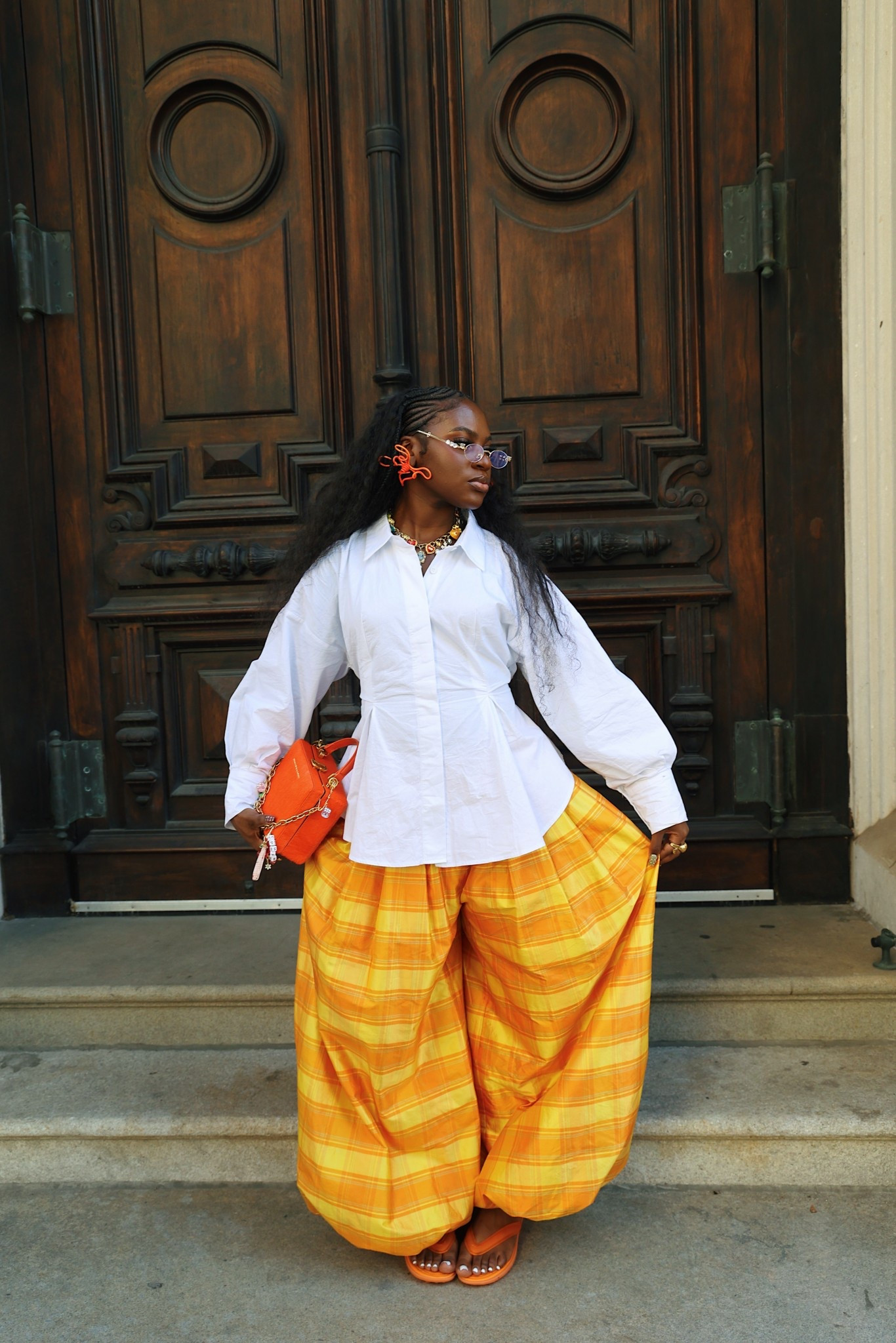 Glasses: Amazon
Shirt: Asos
Pants: Christopher John Rogers
Shoes: Fenty Puma
Bag: Brandon Blackwood 
Earrings: Aurabyjewel

#LTKNYFW