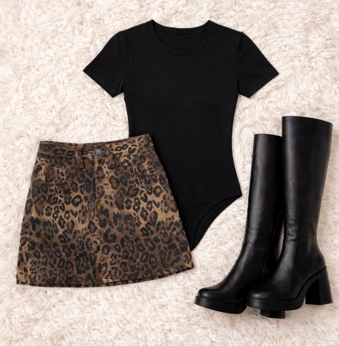 Leopard mini + a classic black bodysuit = the easiest outfit formula 🖤🐆
I love how a simple fitted top lets the statement skirt do all the talking. Paired it with chunky knee-high boots for that effortless cool-girl vibe



#LTKSeasonal #LTKFestival #LTKootd