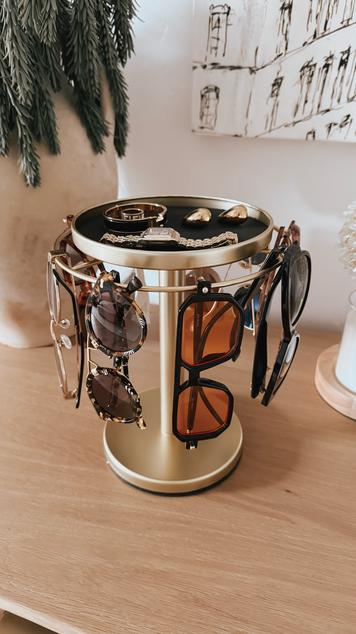 This sunglass organizer is so cute and functional! These are some of my favorite sunglasses I wear year round ☀️🕶️

#LTKHome