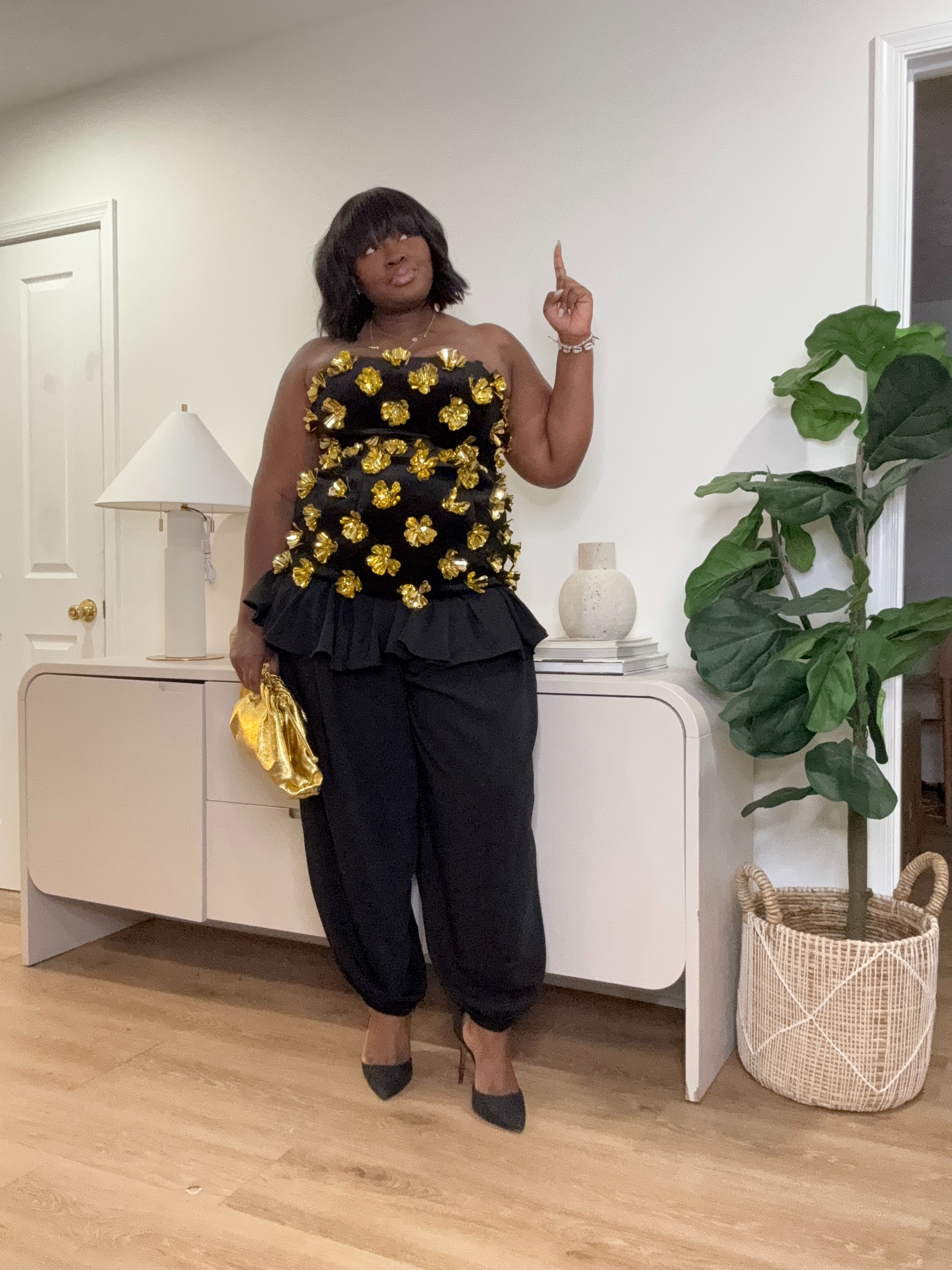 Every wardrobe needs one piece that feels unforgettable. This ARRANGE 3D floral bandeau top is mine. It transforms tailored pants into a full glam moment without trying too hard. #ARRANGE #StatementTop #EveningWear #3DFloral #OccasionWear 

 #LTKootd #LTKSeasonal #LTKMidsize