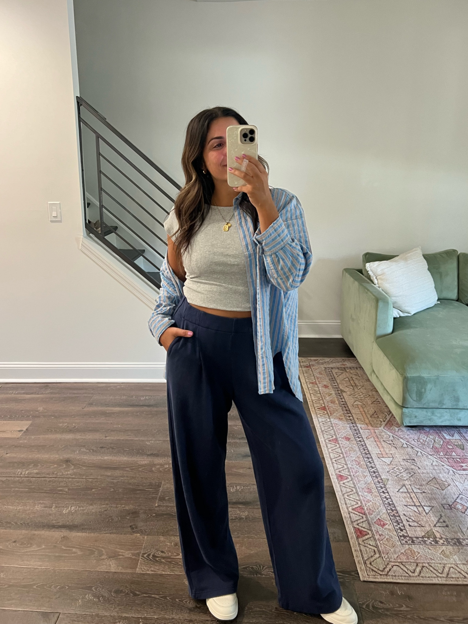 Love this cute and comfy look from Aerie! These trousers sweatpants are amazing - they have pleats so they look tailored, but are super comfortable. This little tee  is actually backless and such a fun basic. Added an oversized button down on top (love the colors) & some sneakers. 

All true to size, M

#workwear #aerie #falloutfits

#LTKFindsUnder50 #LTKFallSale #LTKStyleTip
