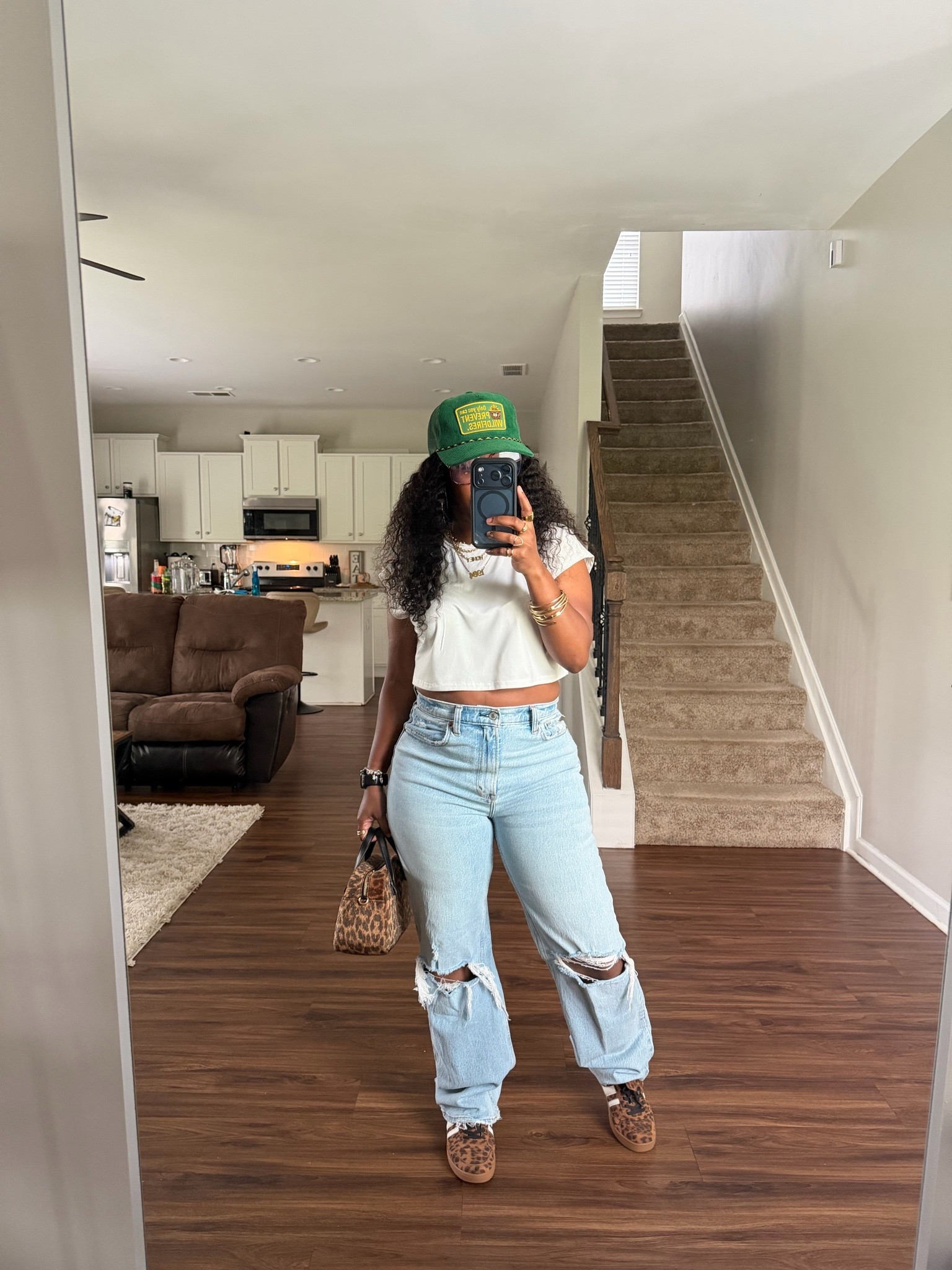 White tee and high waisted jeans.

#LTKootd #LTKOver40 #LTKPetite