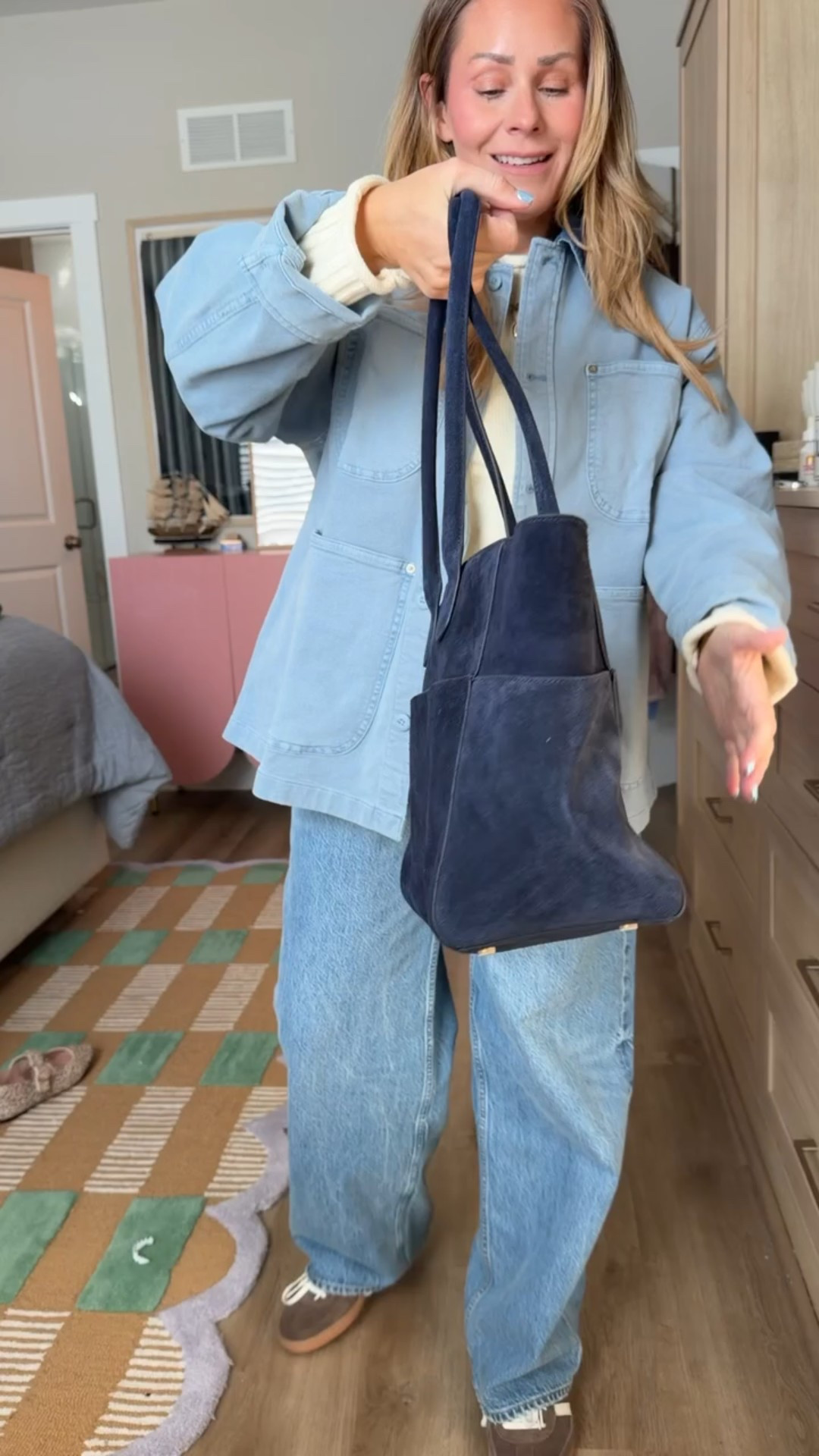 The winter work bag I actually use 🤎 Structured enough to look polished, soft suede that feels elevated, and big enough for real life — laptop, planner, snacks, everything.  This is the Quince Italian suede shopper tote and it gives quiet luxury without the designer price tag. It instantly makes winter outfits feel more put together, whether I’m heading to meetings, school pickup, or coffee runs.  If you’ve been looking for a chic, functional winter work tote, this is it.

#LTKstorytime #LTKgrwm #LTKootd